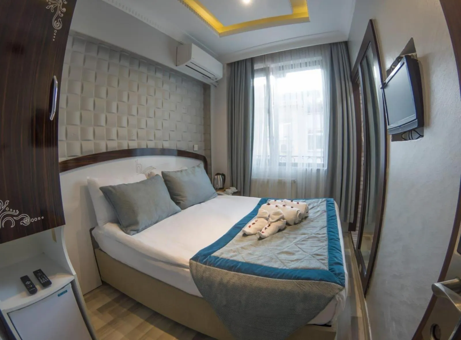 Bed in Grand Esen Hotel