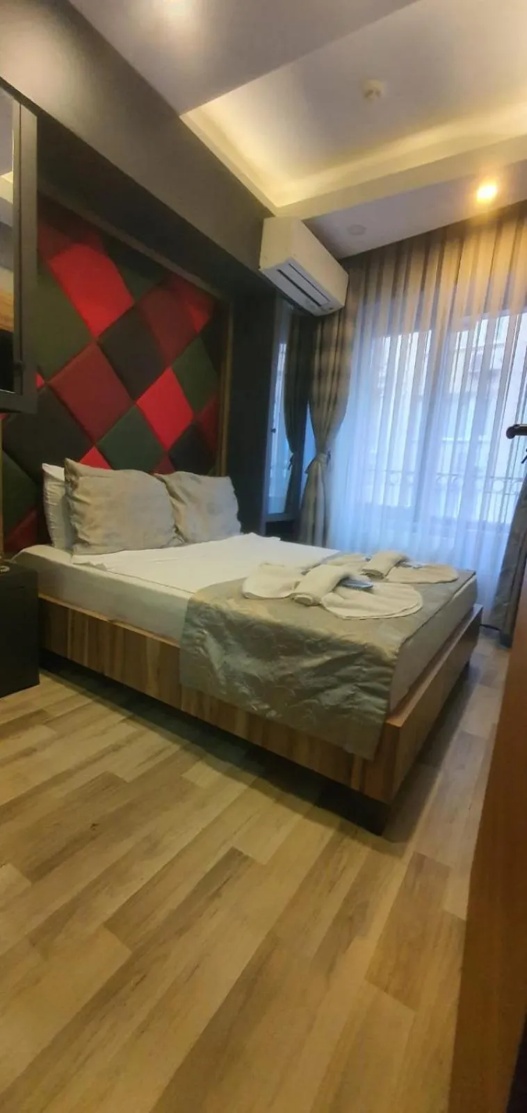 Bed in Grand Esen Hotel