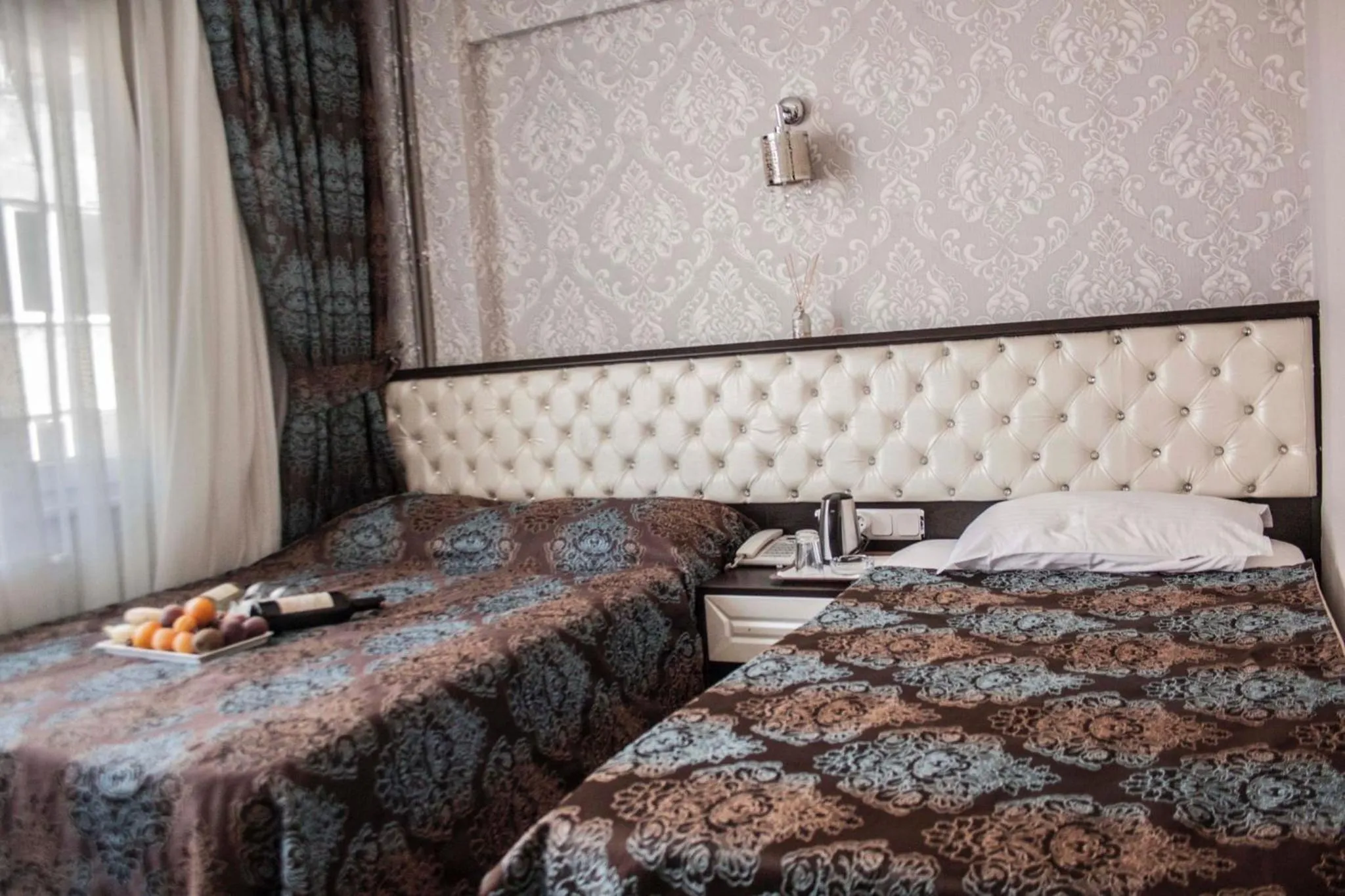 Bed in Grand Esen Hotel