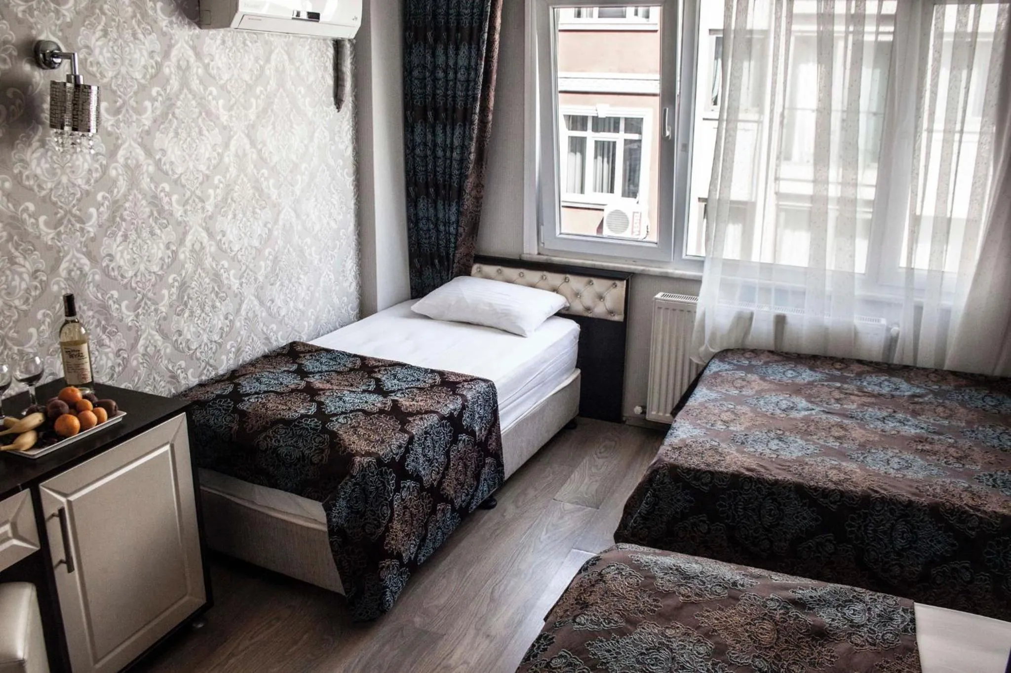 Bed in Grand Esen Hotel