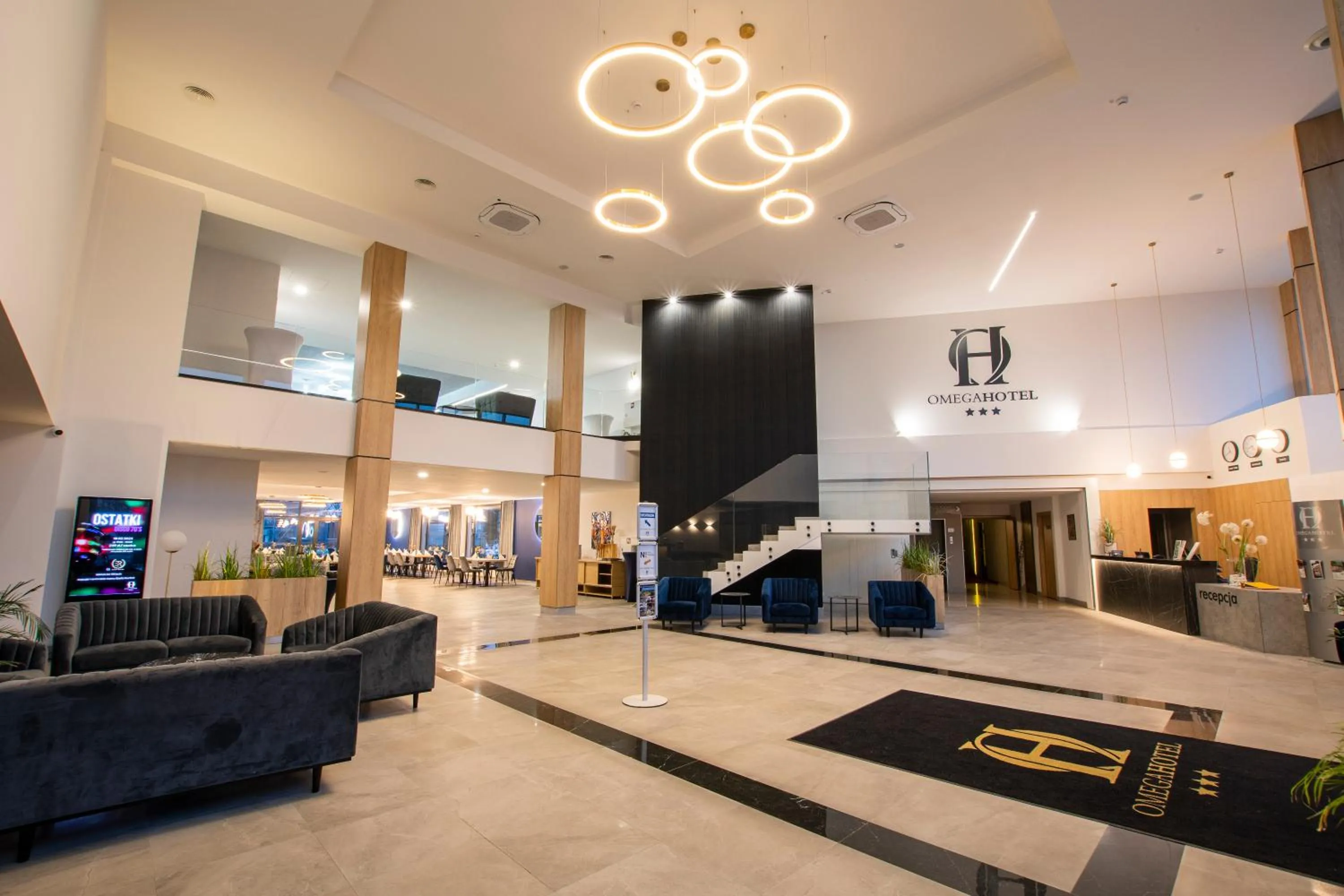 Lobby or reception in Omega Hotel