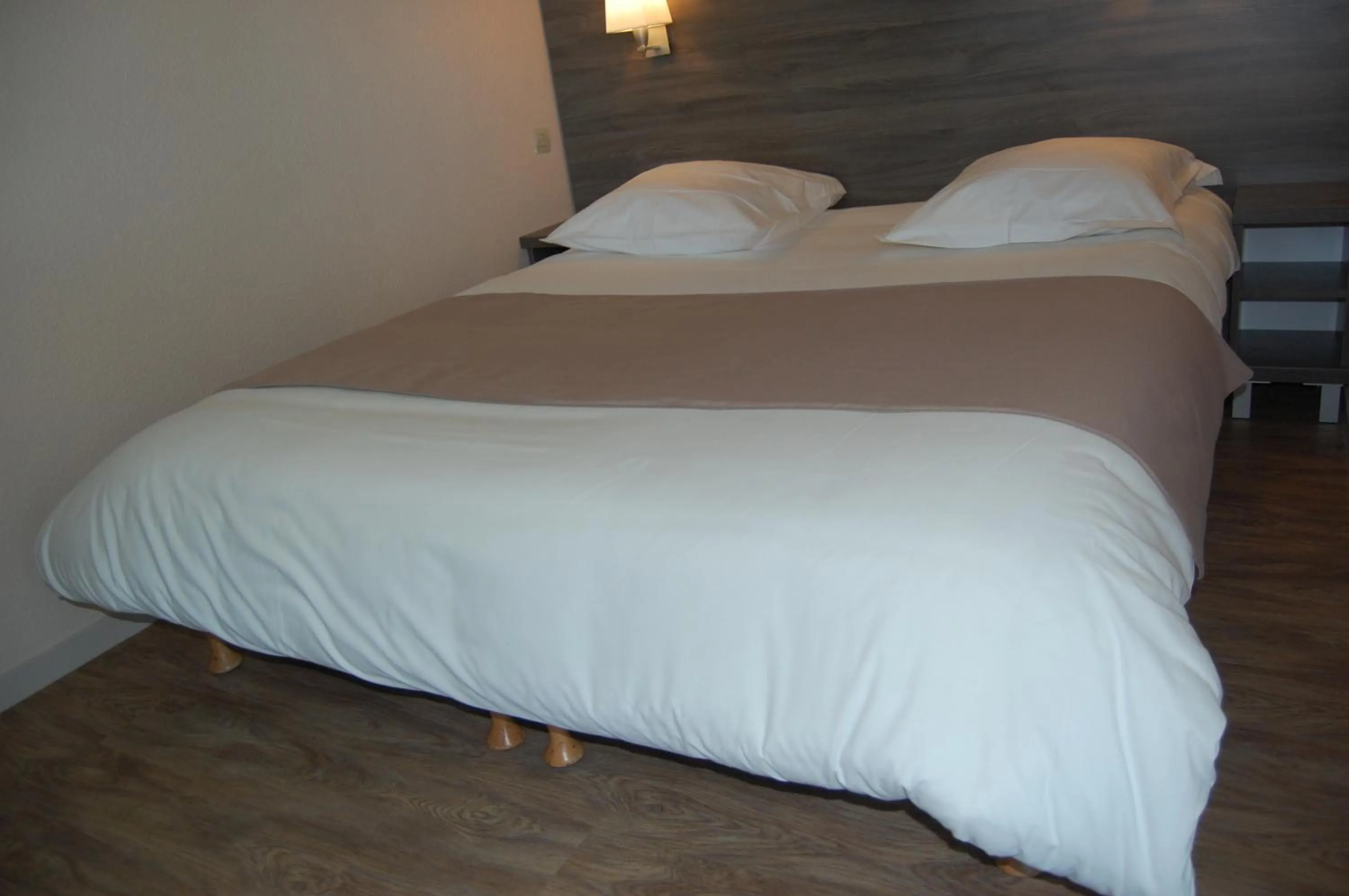 Photo of the whole room, Bed in Logis Hotel des Portes de Meuse