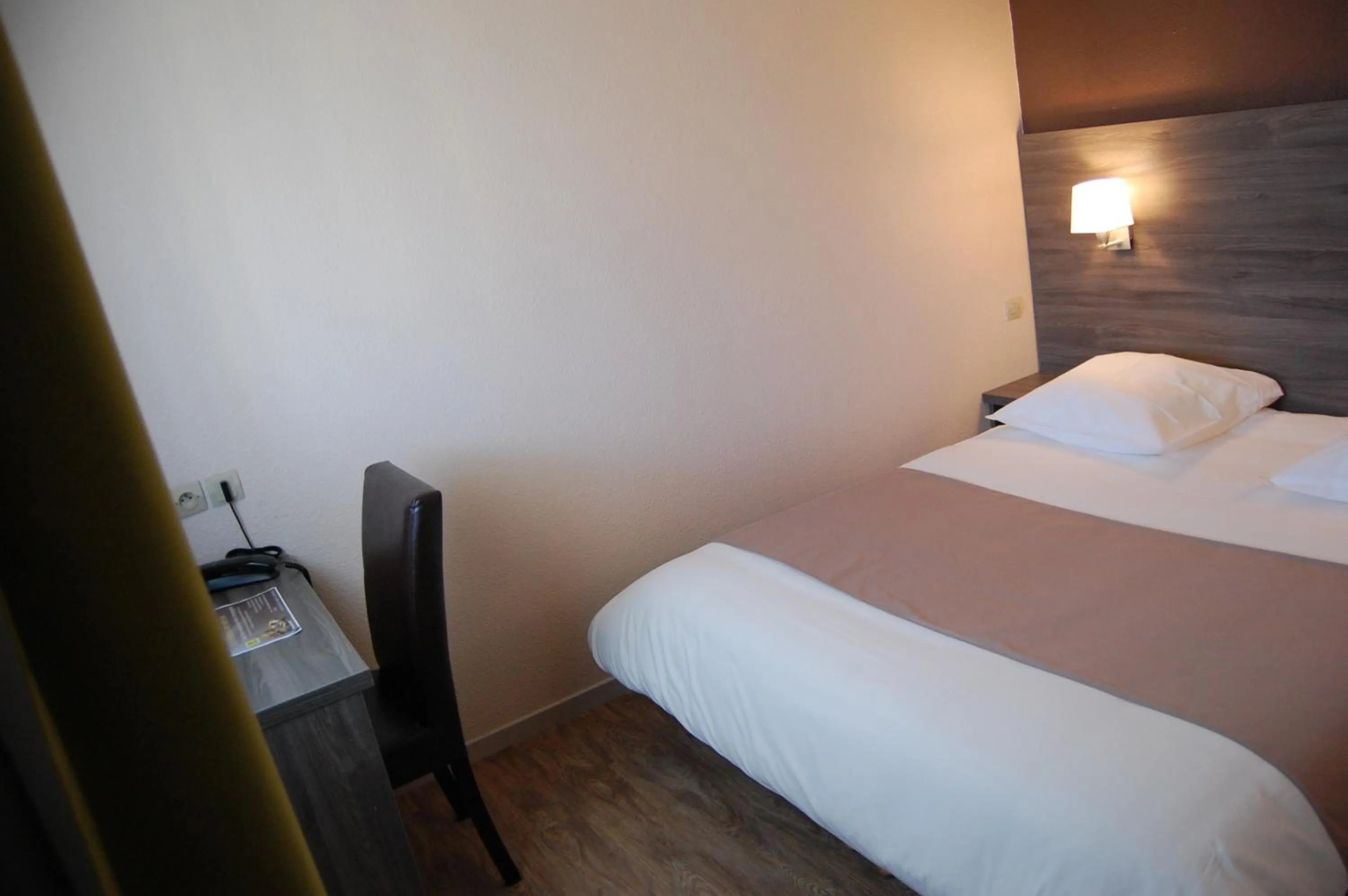 Photo of the whole room, Bed in Logis Hotel des Portes de Meuse