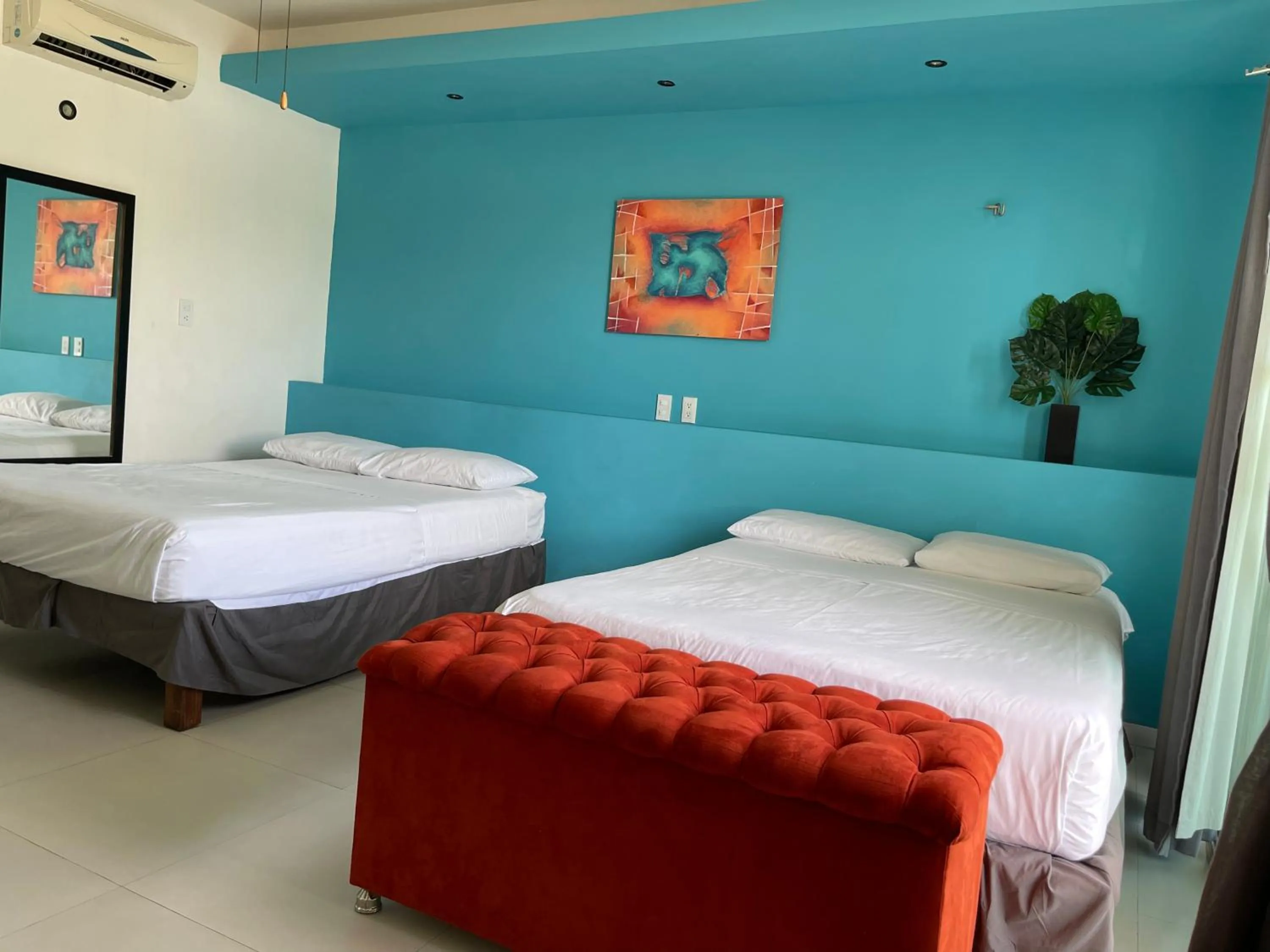 Bed in Hotel Villa Escondida Campeche