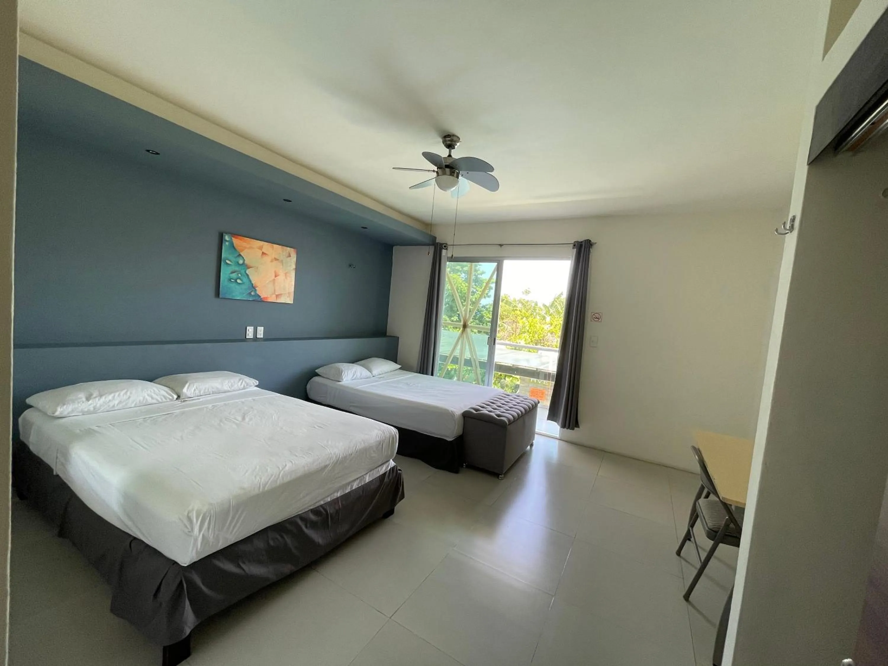 Bed in Hotel Villa Escondida Campeche