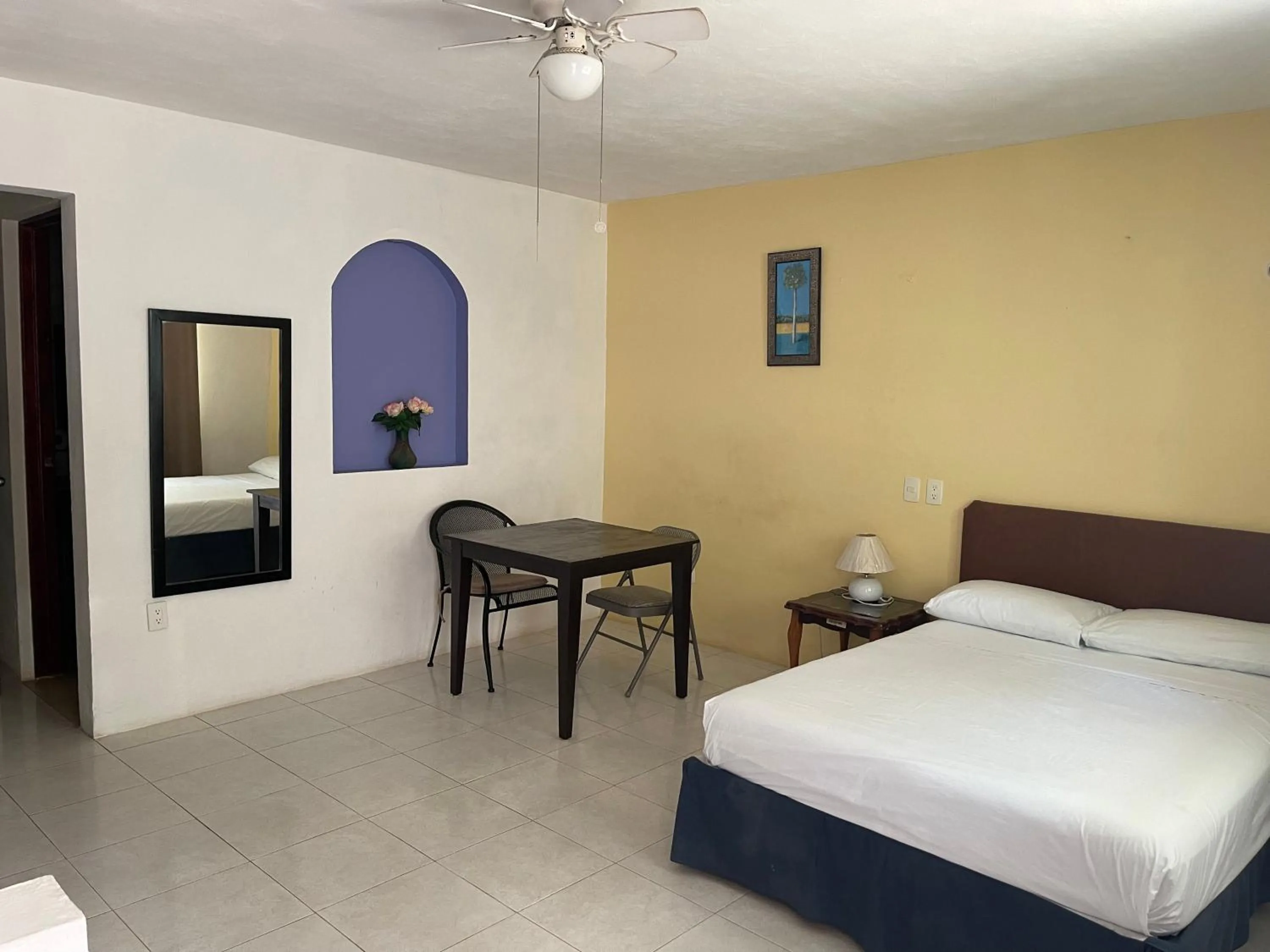 Bed in Hotel Villa Escondida Campeche