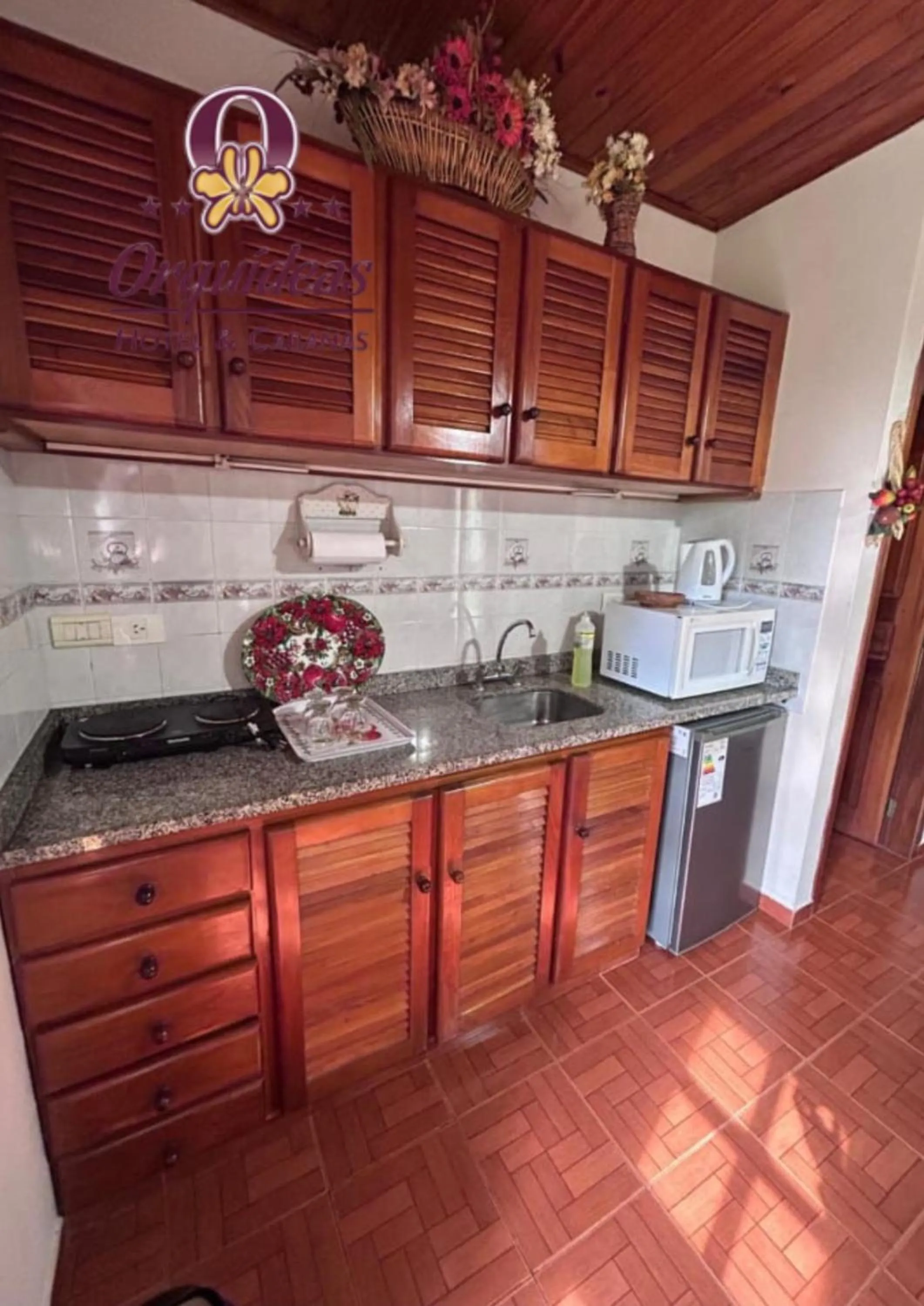 Kitchen or kitchenette in Orquideas Hotel & Cabañas