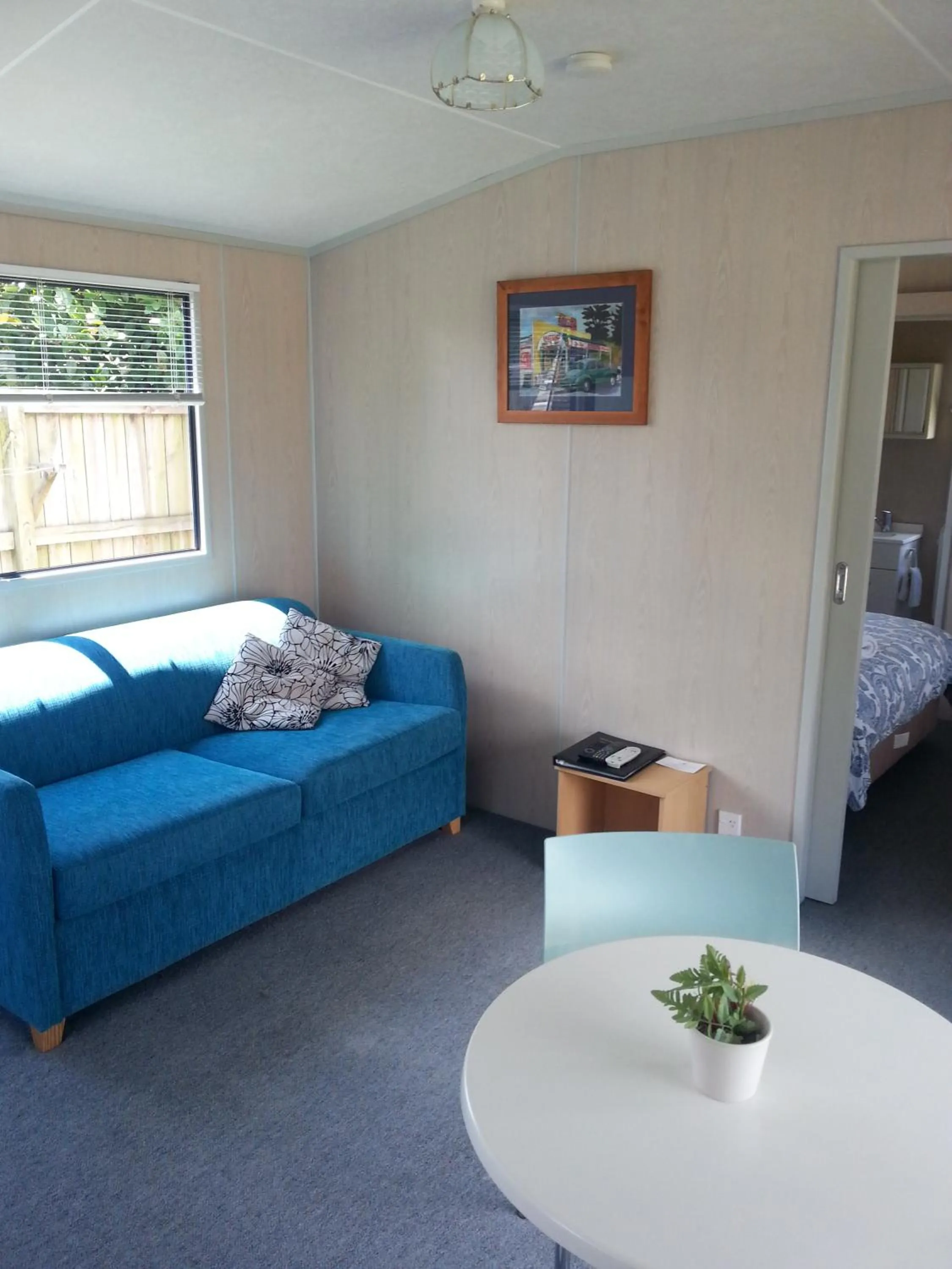 Living room, Bed in Athenree Hot Springs & Holiday Park