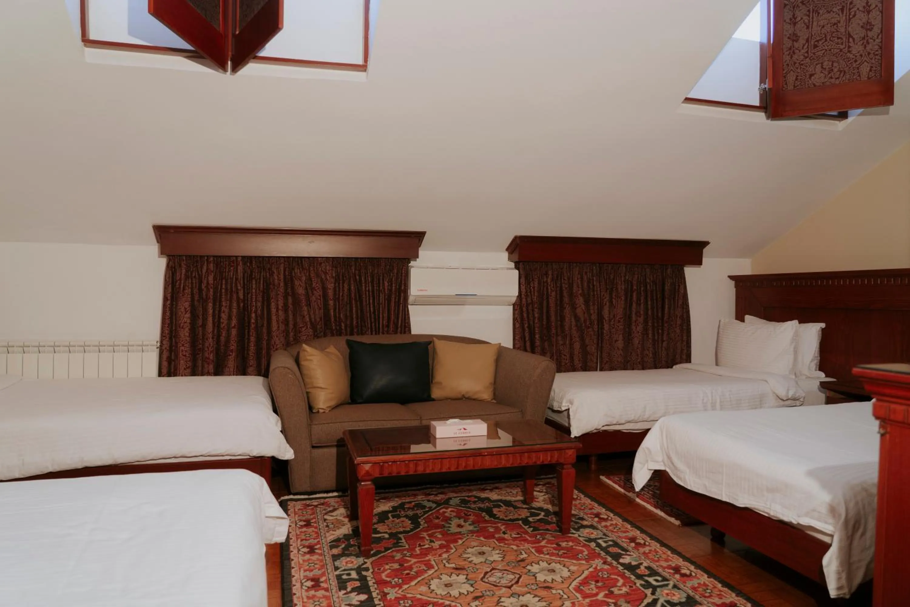 Bed in Le Cedrus Hotel