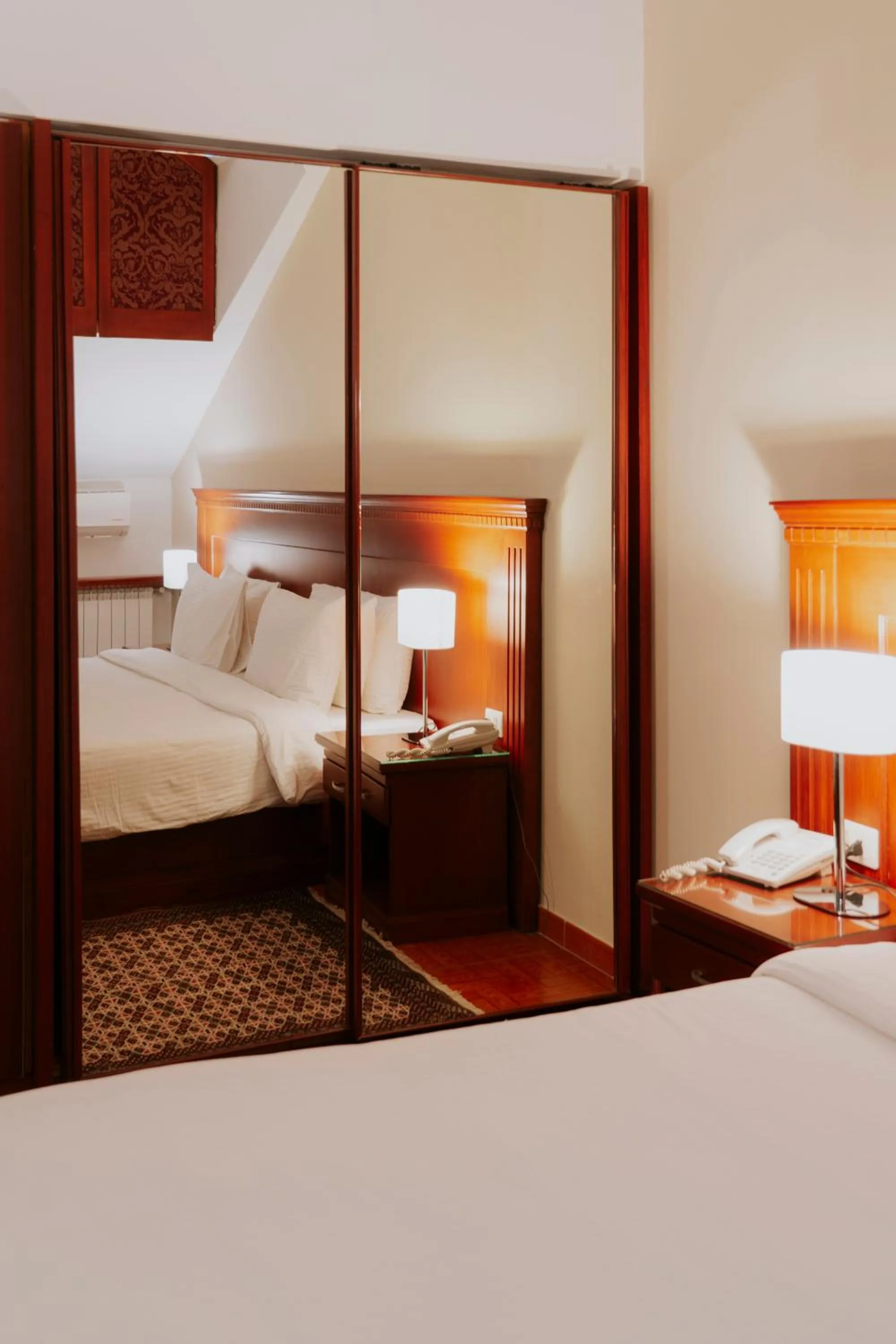 Bed in Le Cedrus Hotel