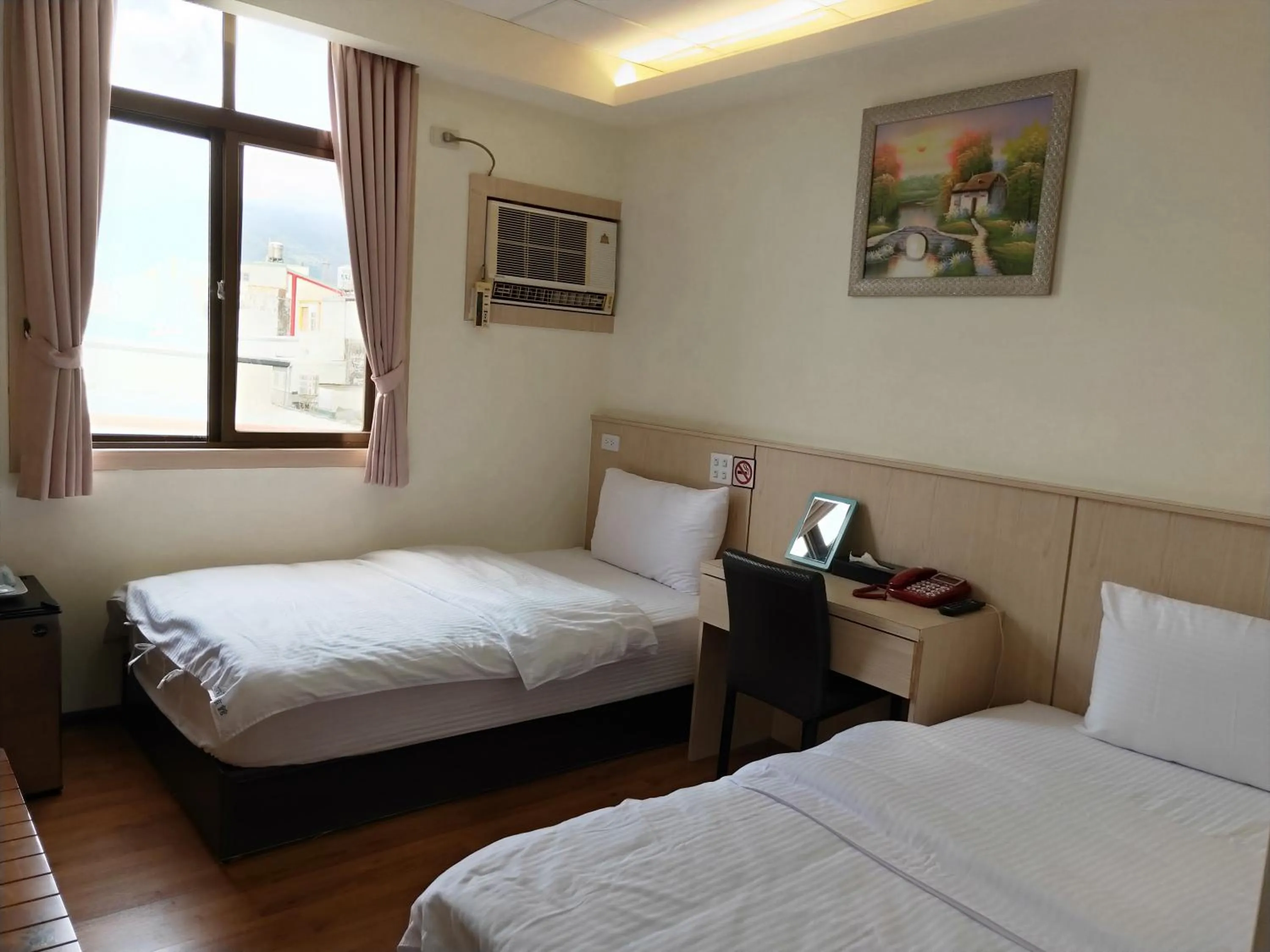 Bed in Oriental Hotel