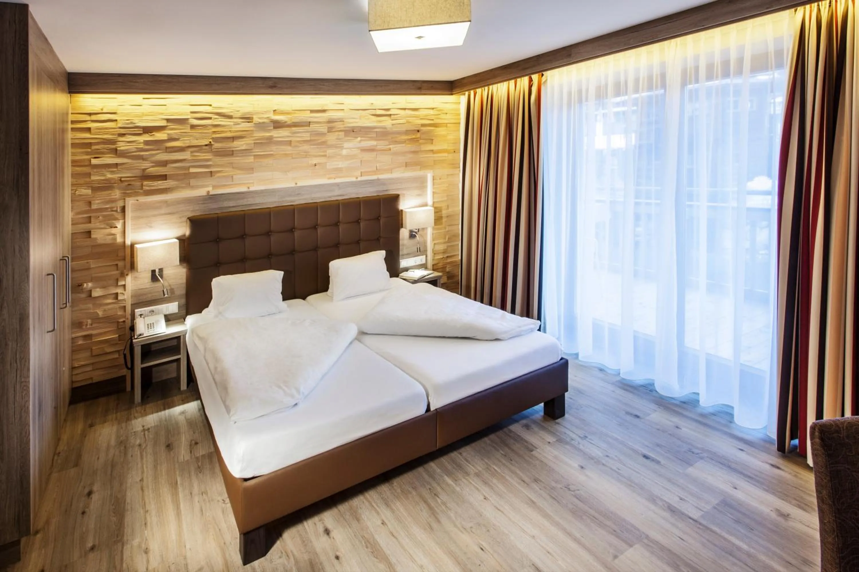 Photo of the whole room, Bed in Hotel am Reiterkogel