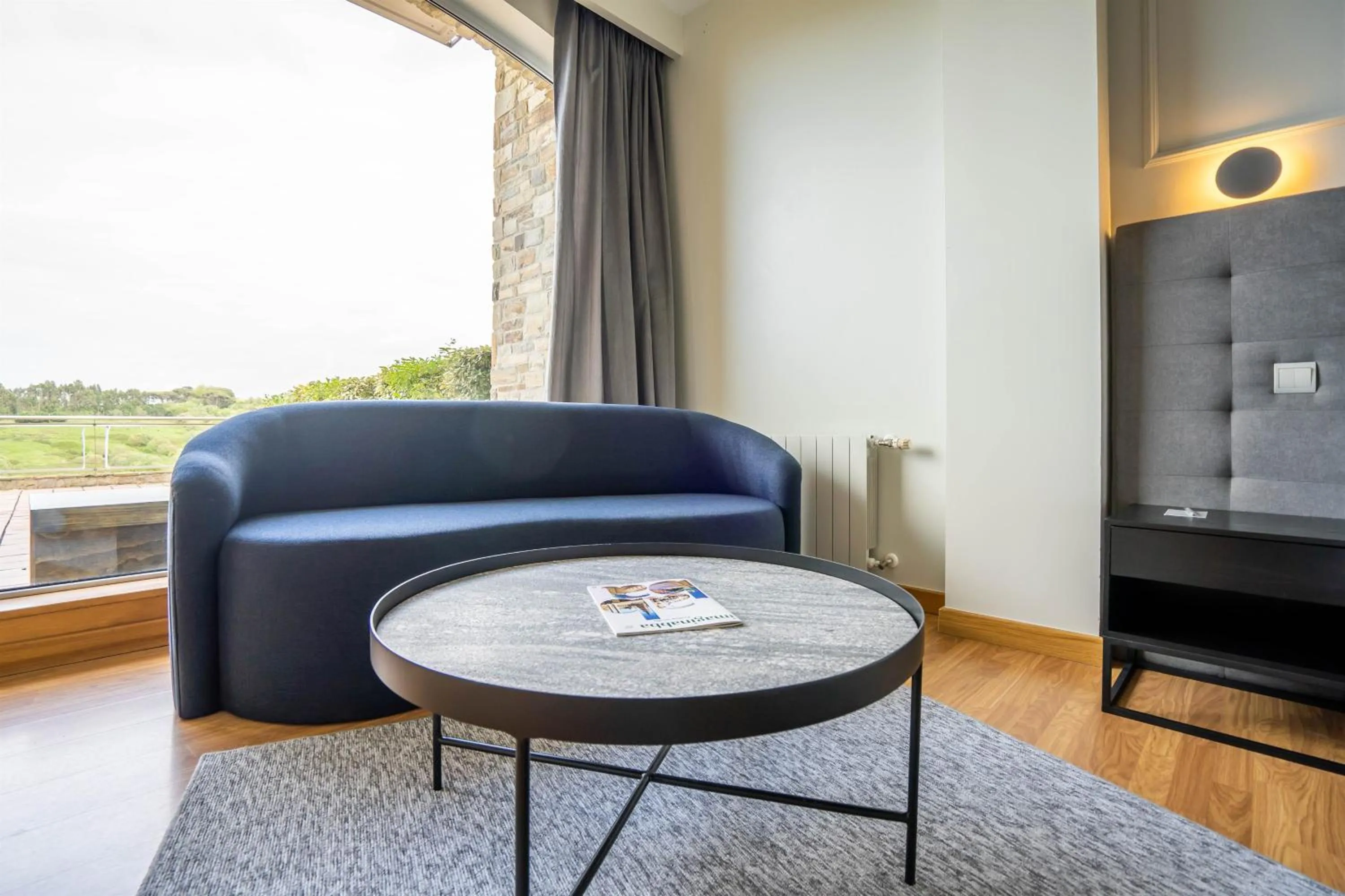 Seating area in Abba Comillas Hotel