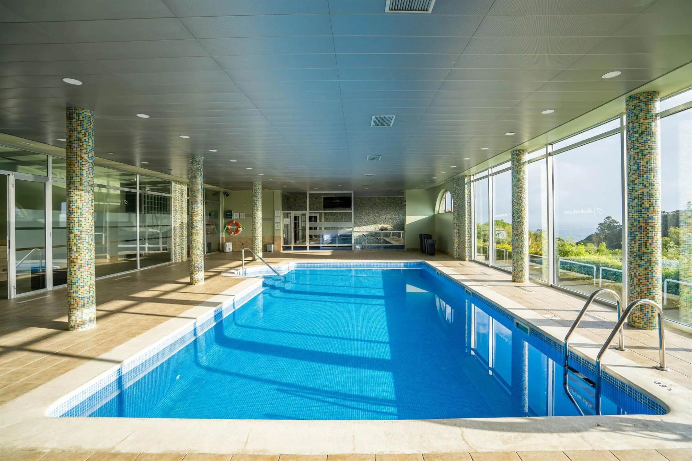 Swimming pool in Abba Comillas Hotel