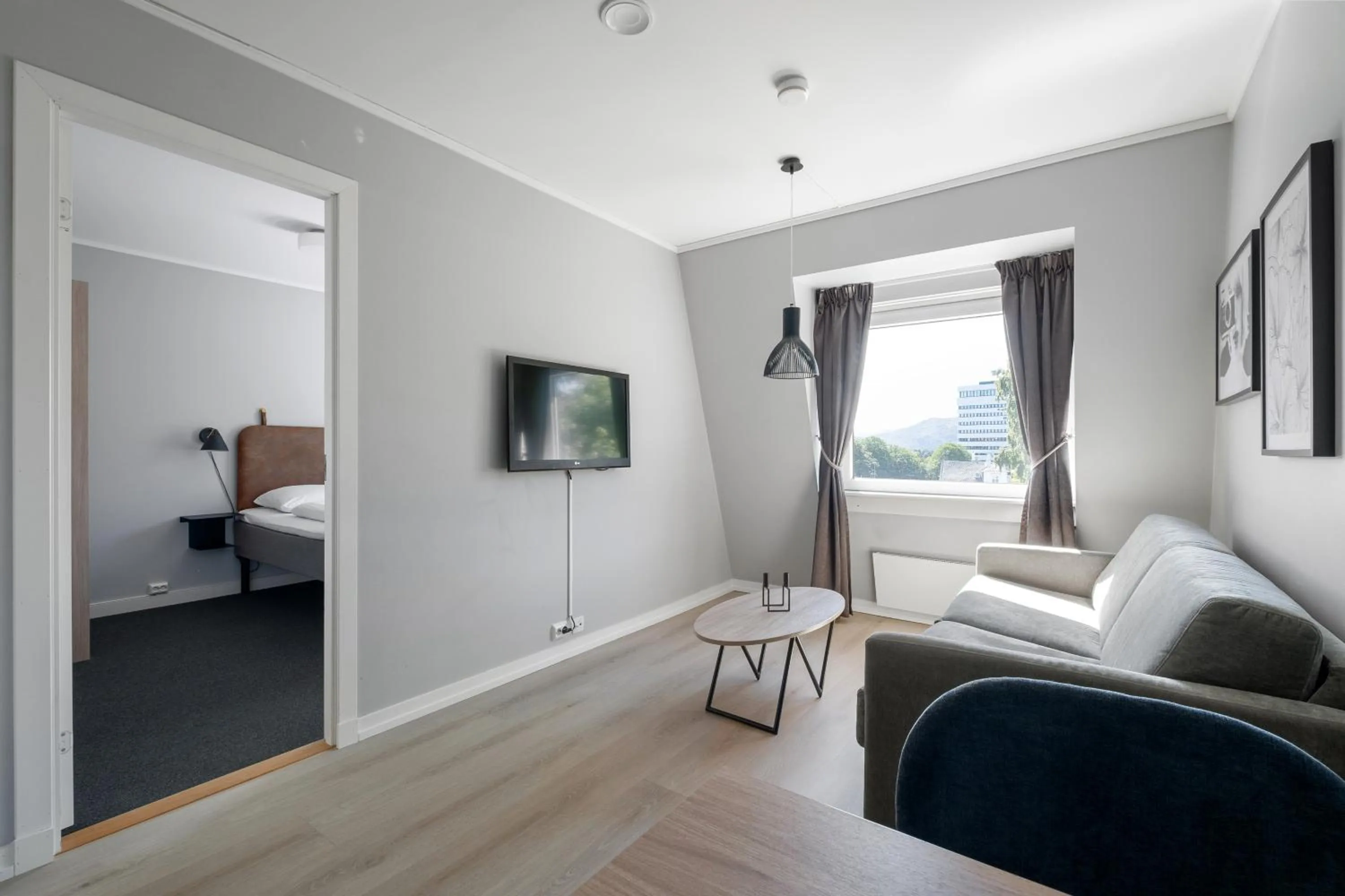 Living room, Bed in Bjørvika Apartments - Sirkus Renaa