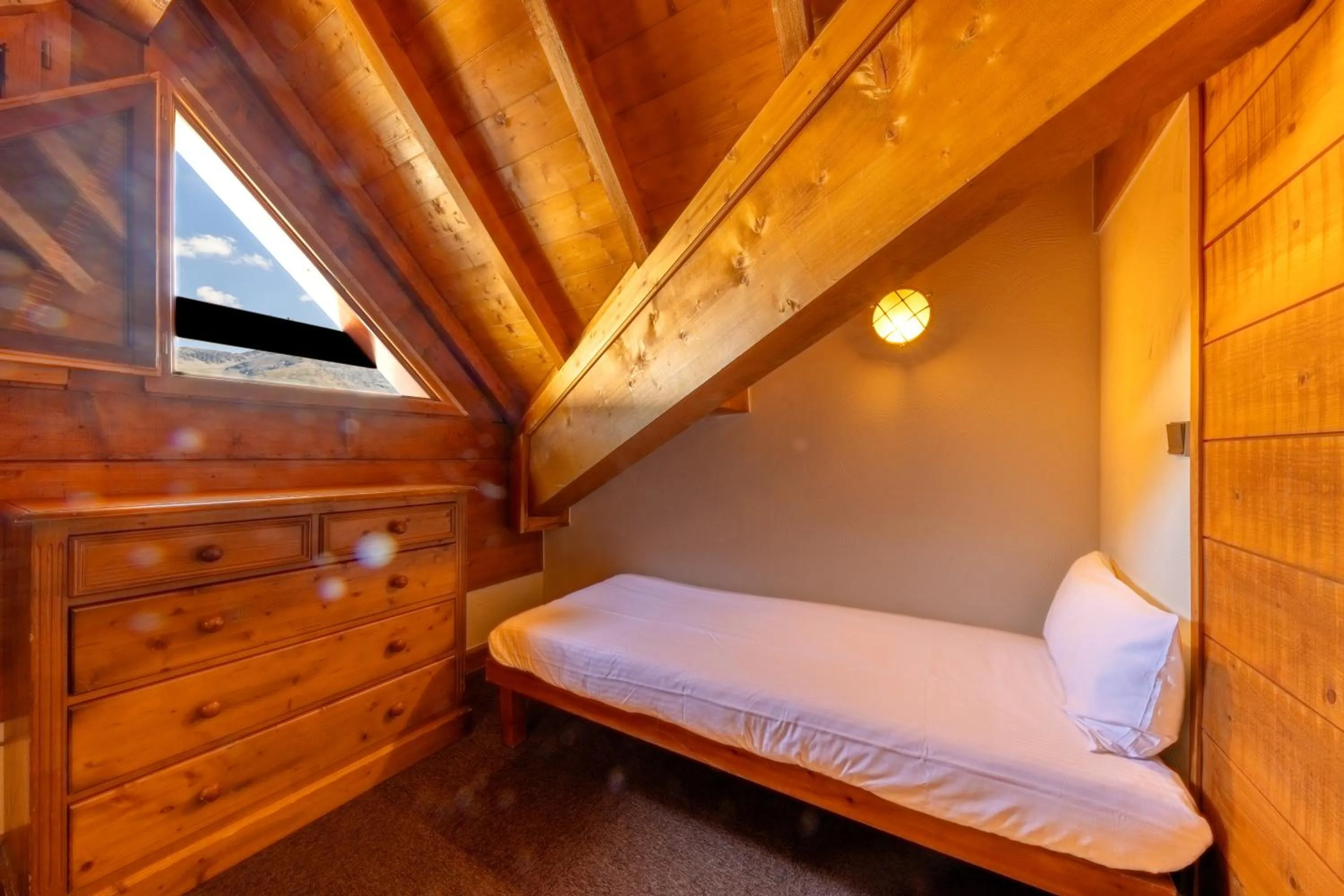 Bed in Résidences Village Montana by Les Etincelles