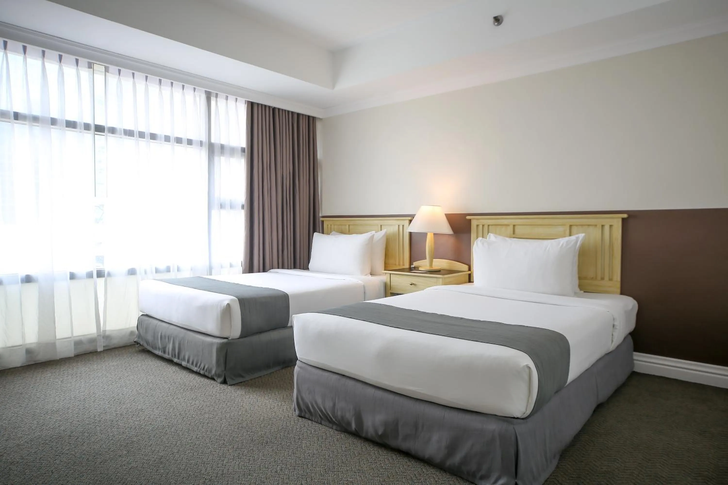 Bedroom in Infinity Tower Suites