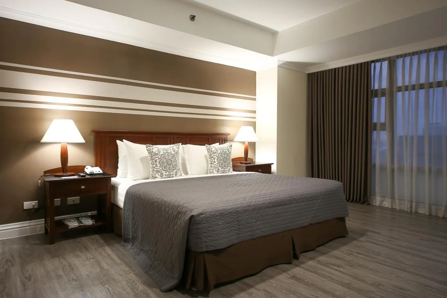 Bed in Infinity Tower Suites