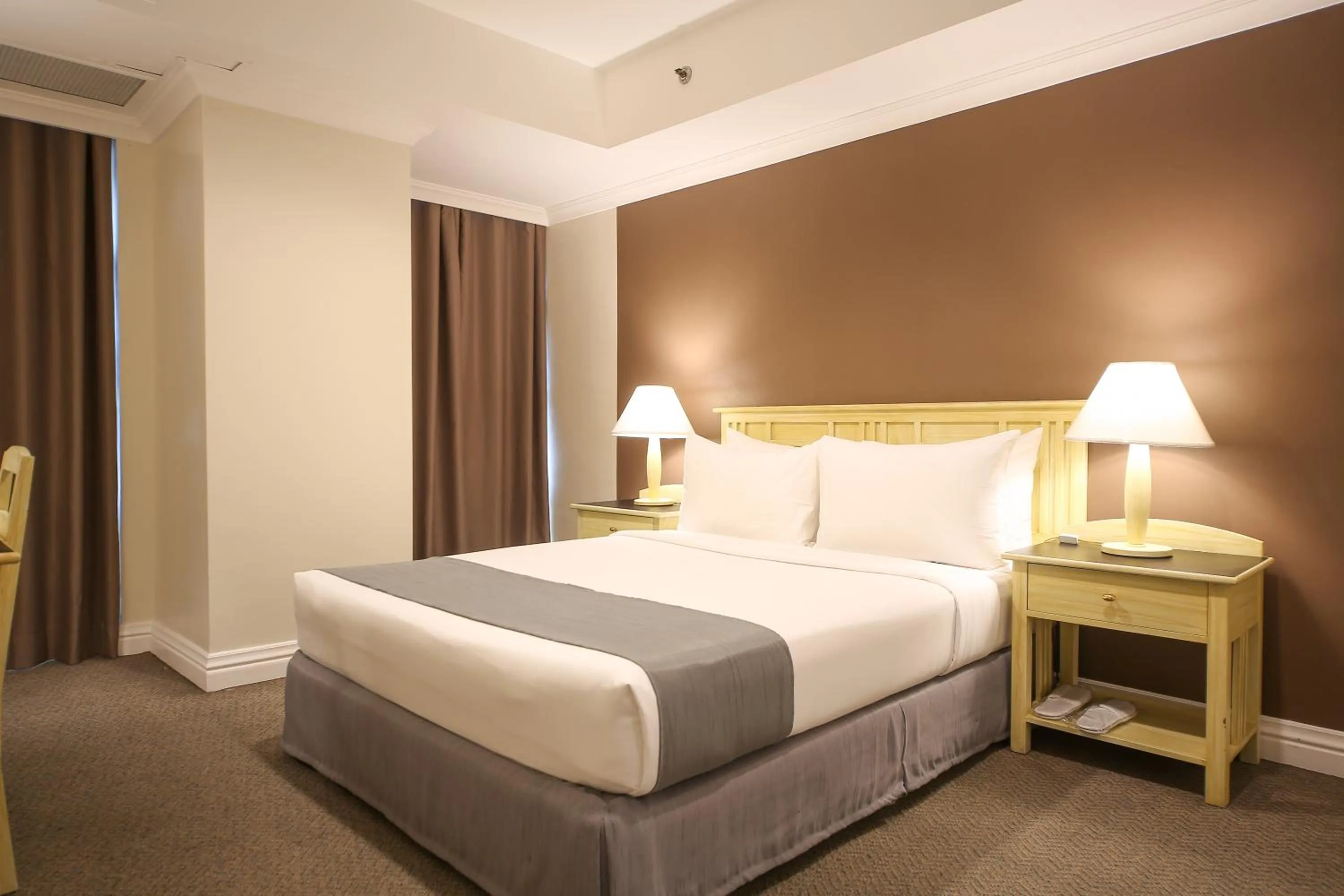 Bedroom in Infinity Tower Suites