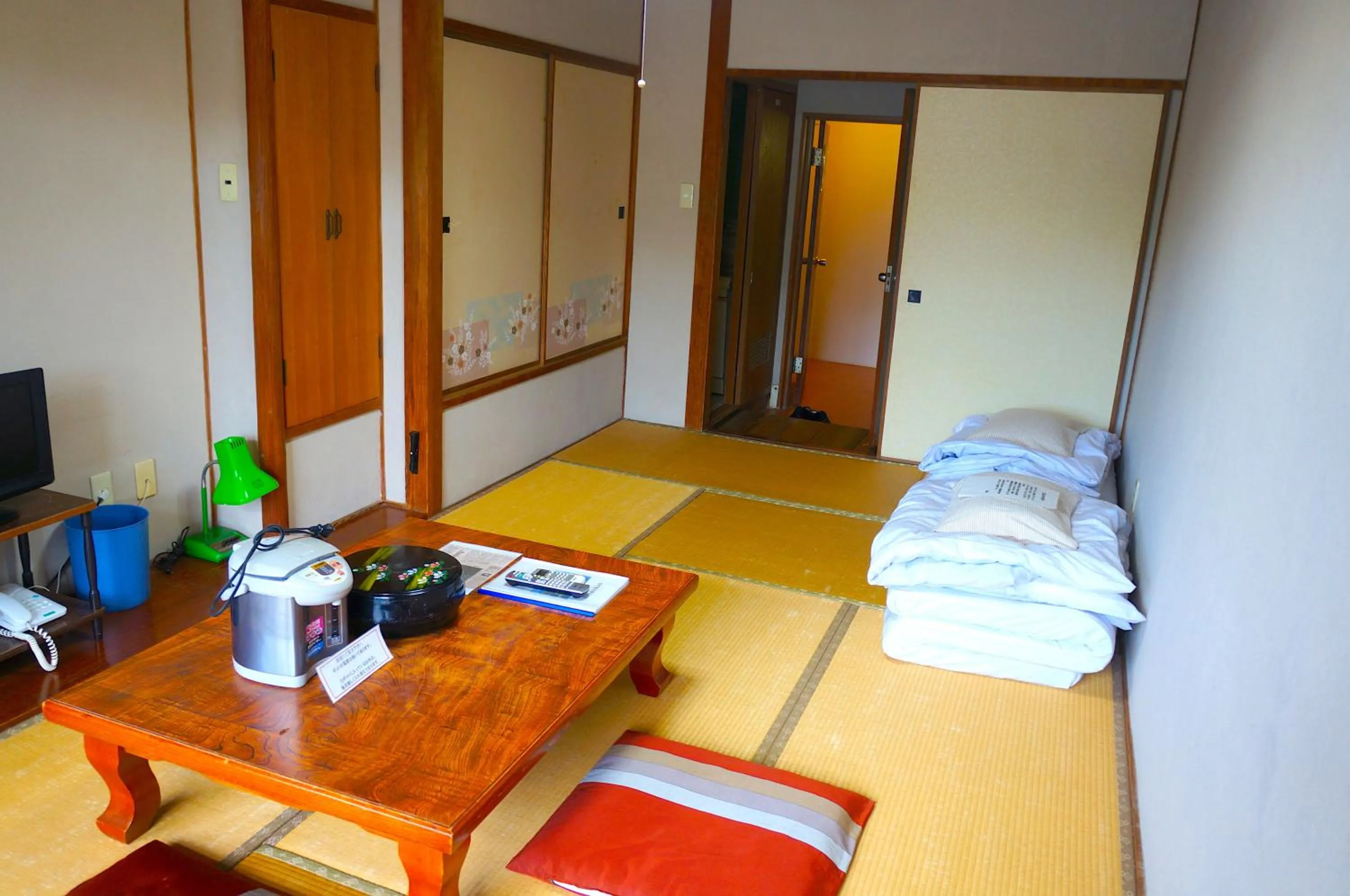 Bed in Hotel Yakushima Sanso
