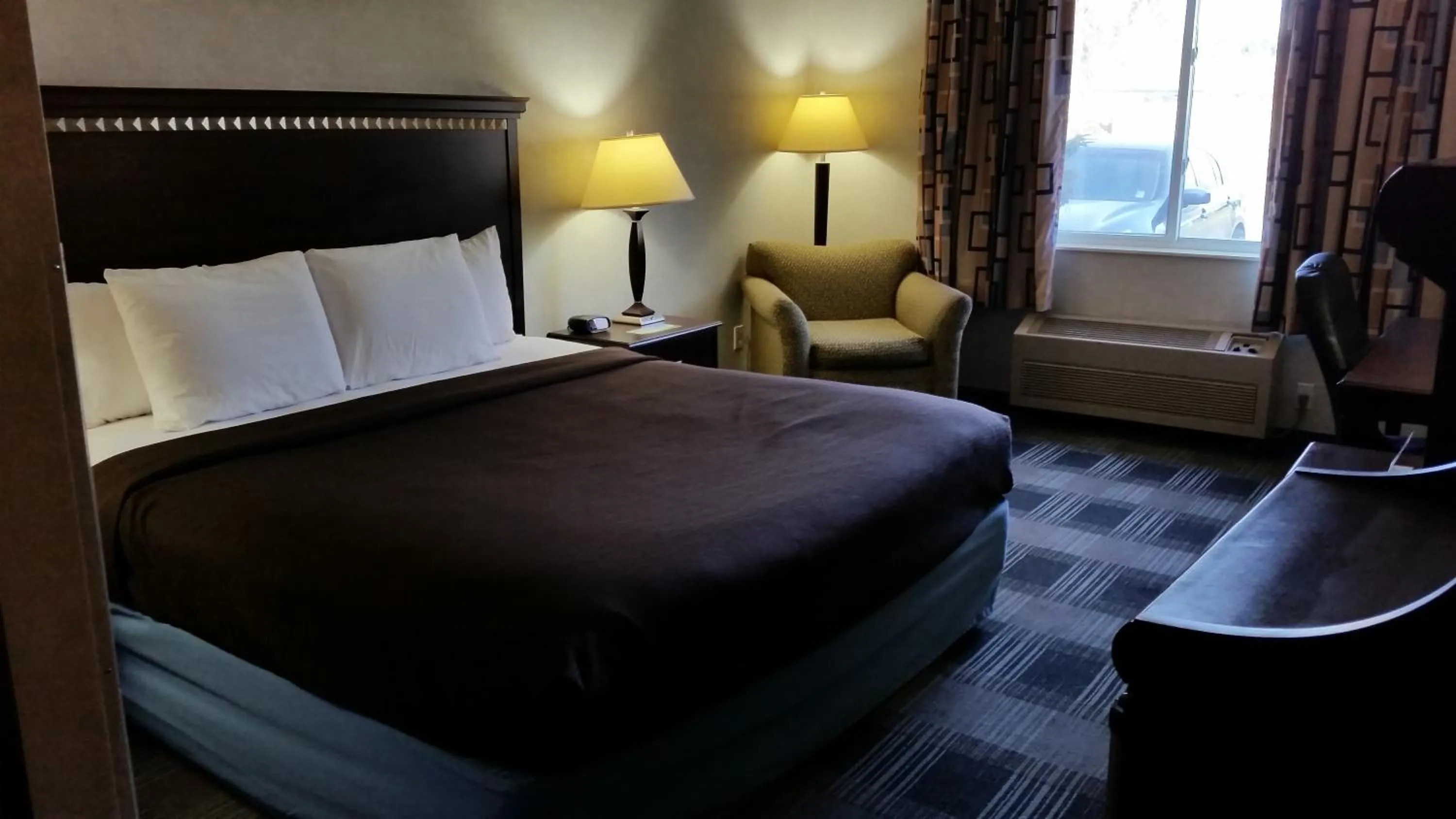 Photo of the whole room, Bed in Days Inn & Suites by Wyndham Vancouver