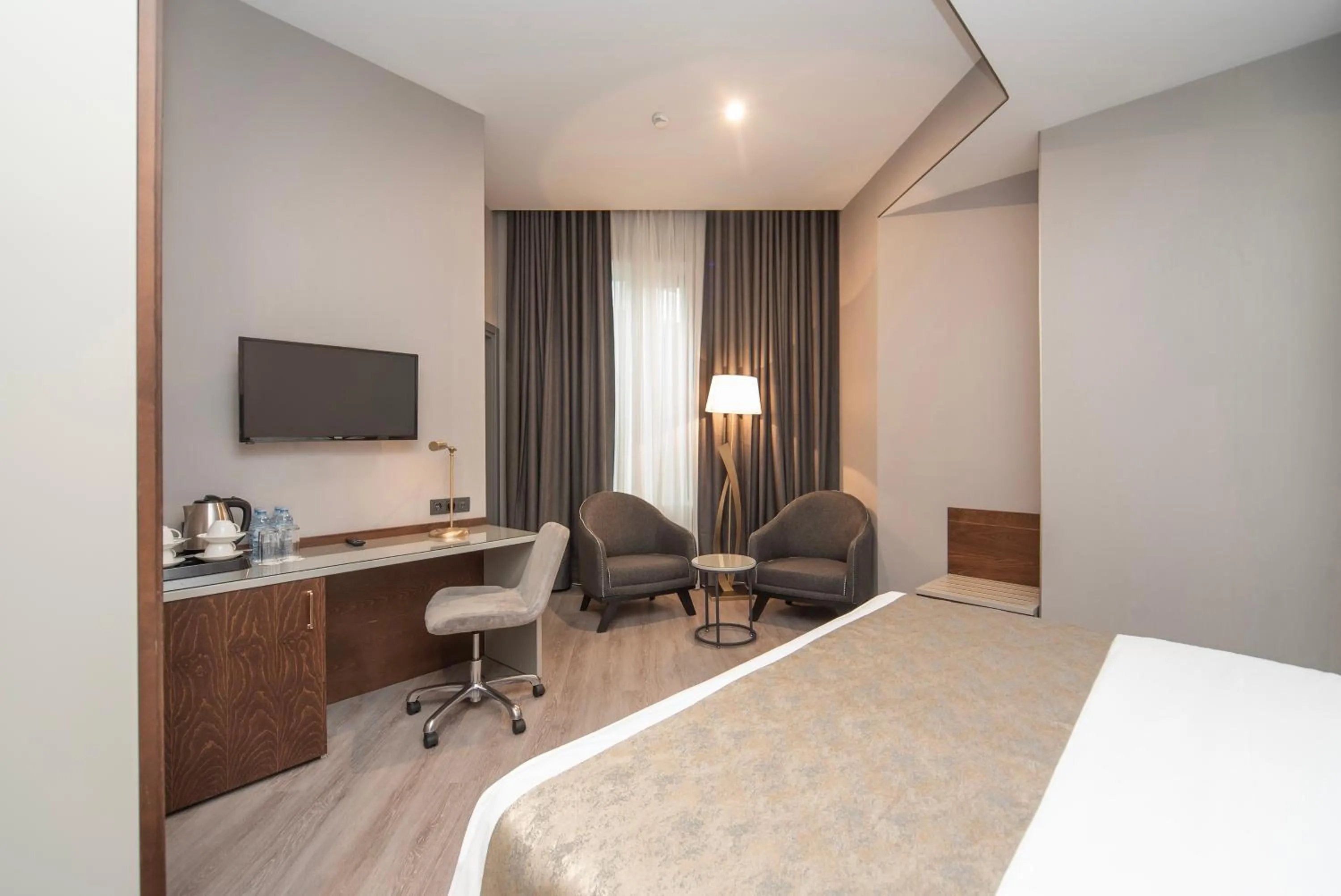 Seating area, Bed in Tbilisi Chambers, Trademark Collection by Wyndham