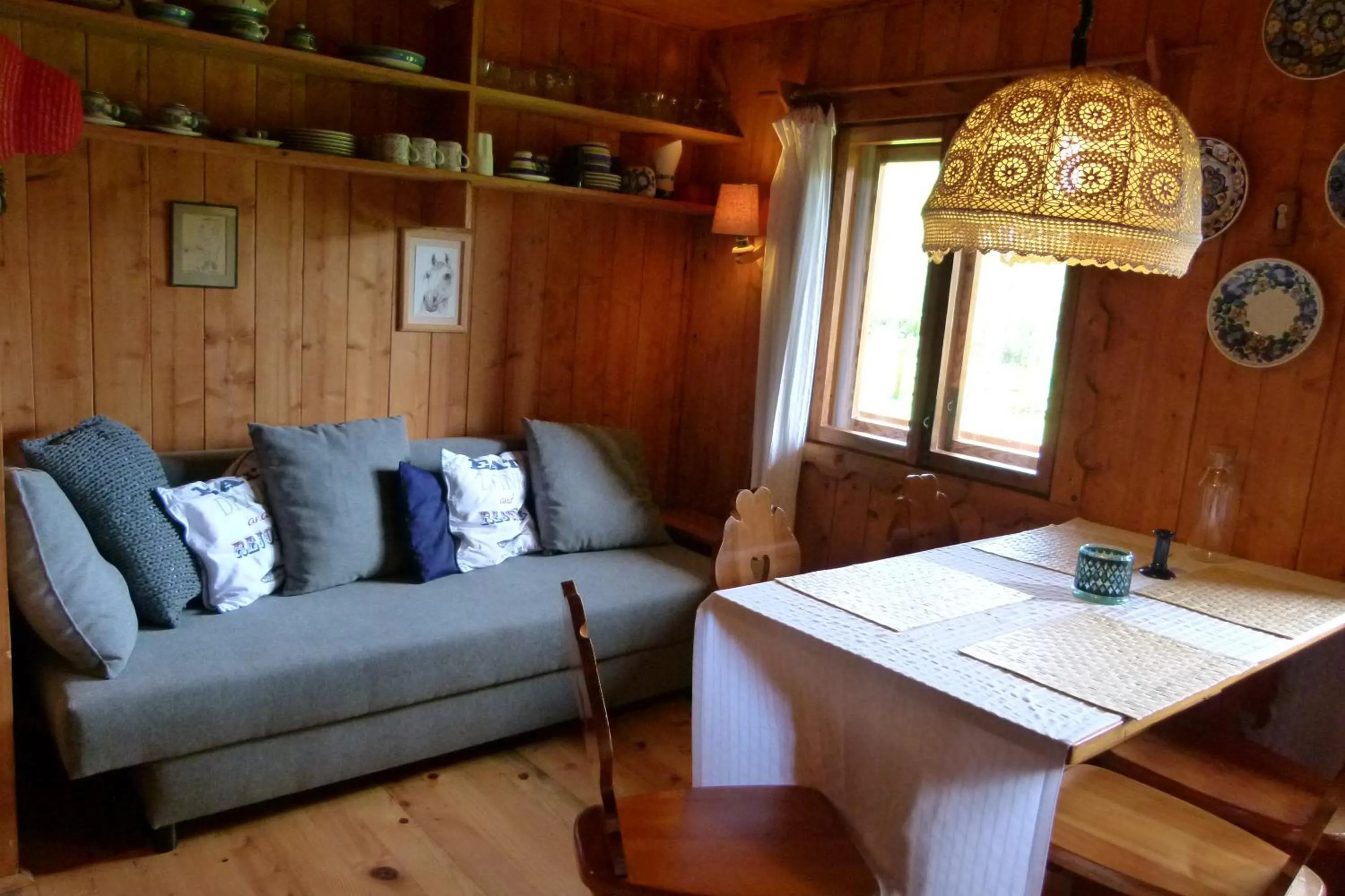 Seating area in Drewniany Domek BB Nad Rzeką