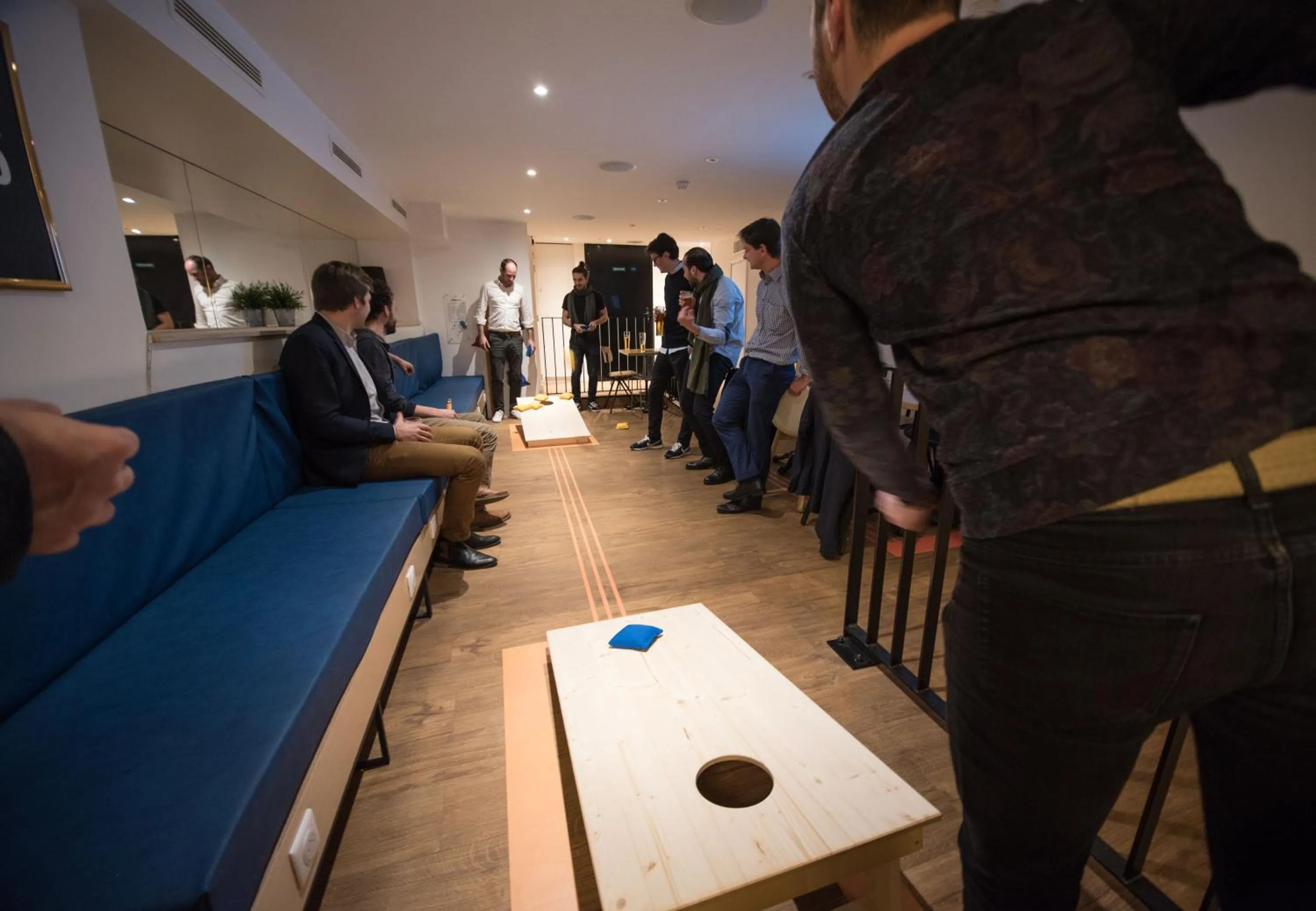 People in Hotel The Playce by Happyculture