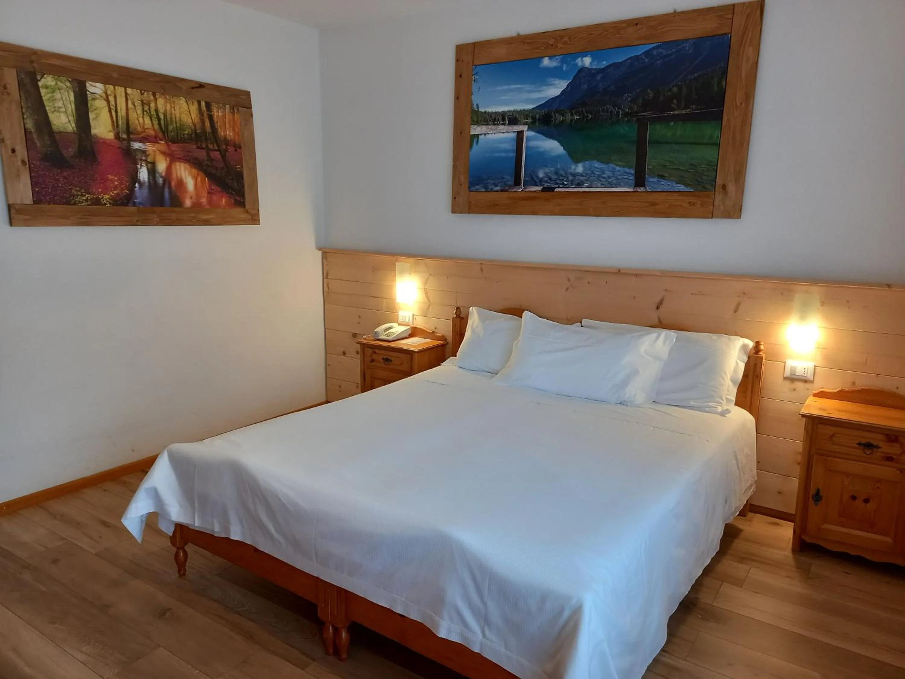 Bed in Albergo Scoiattolo