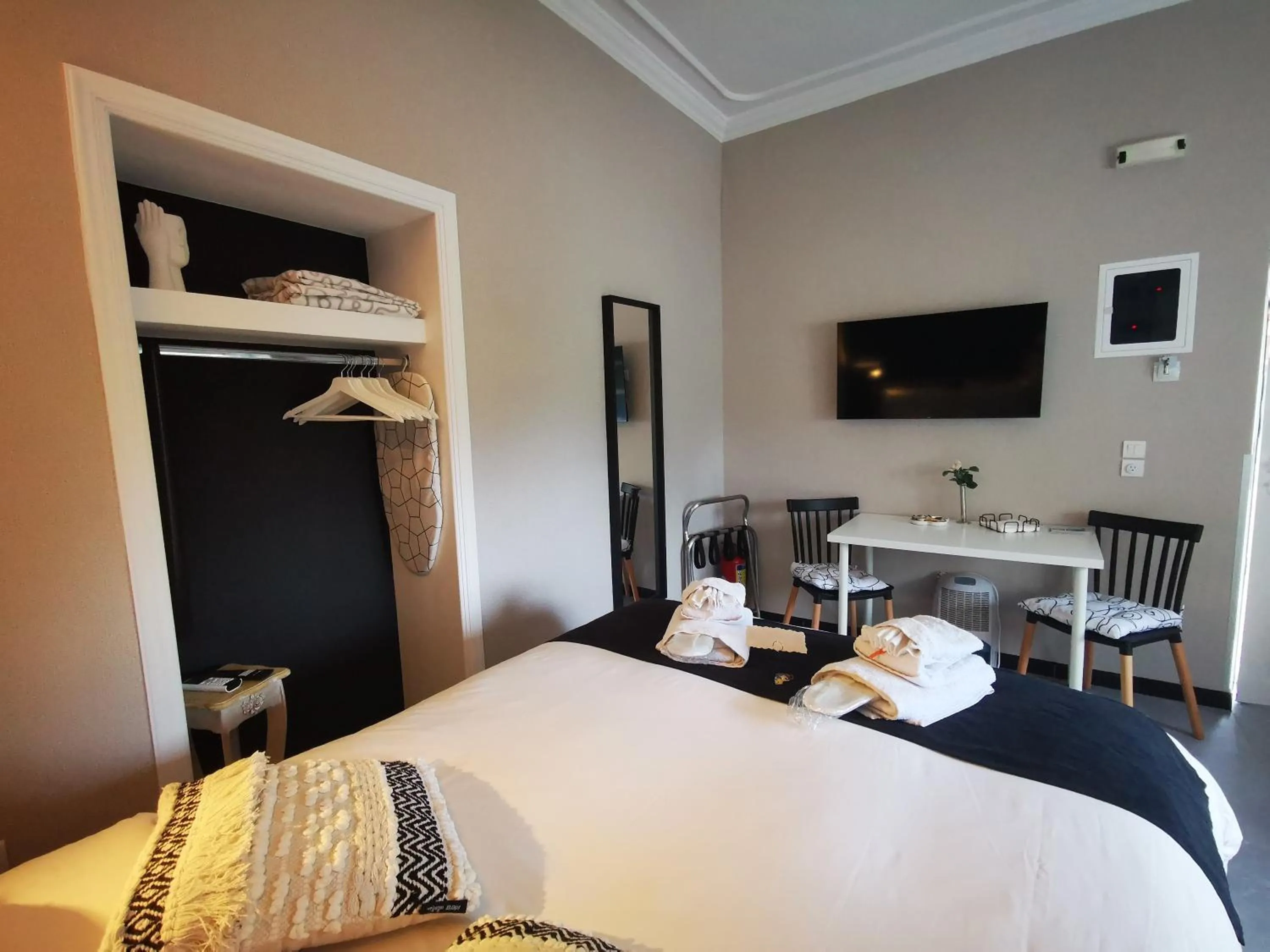 Bed in Natalie Apartments