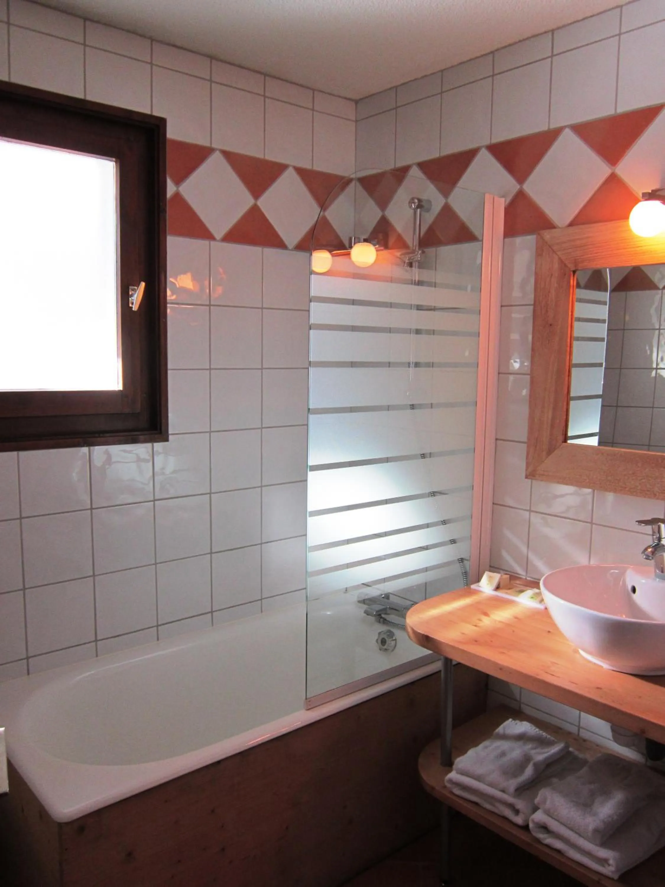 Bathroom in Logis Hotel Gai Soleil
