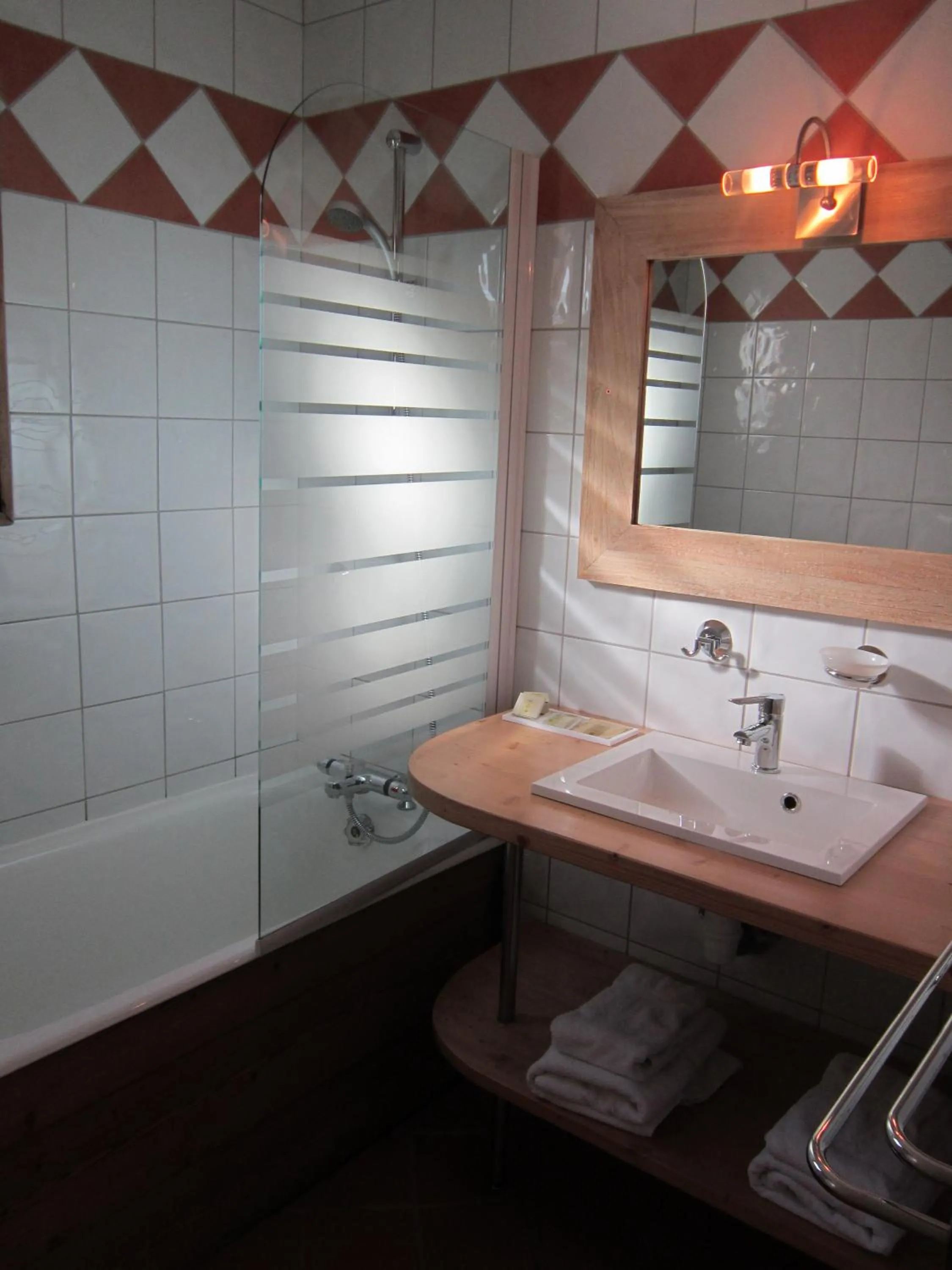 Bathroom in Logis Hotel Gai Soleil