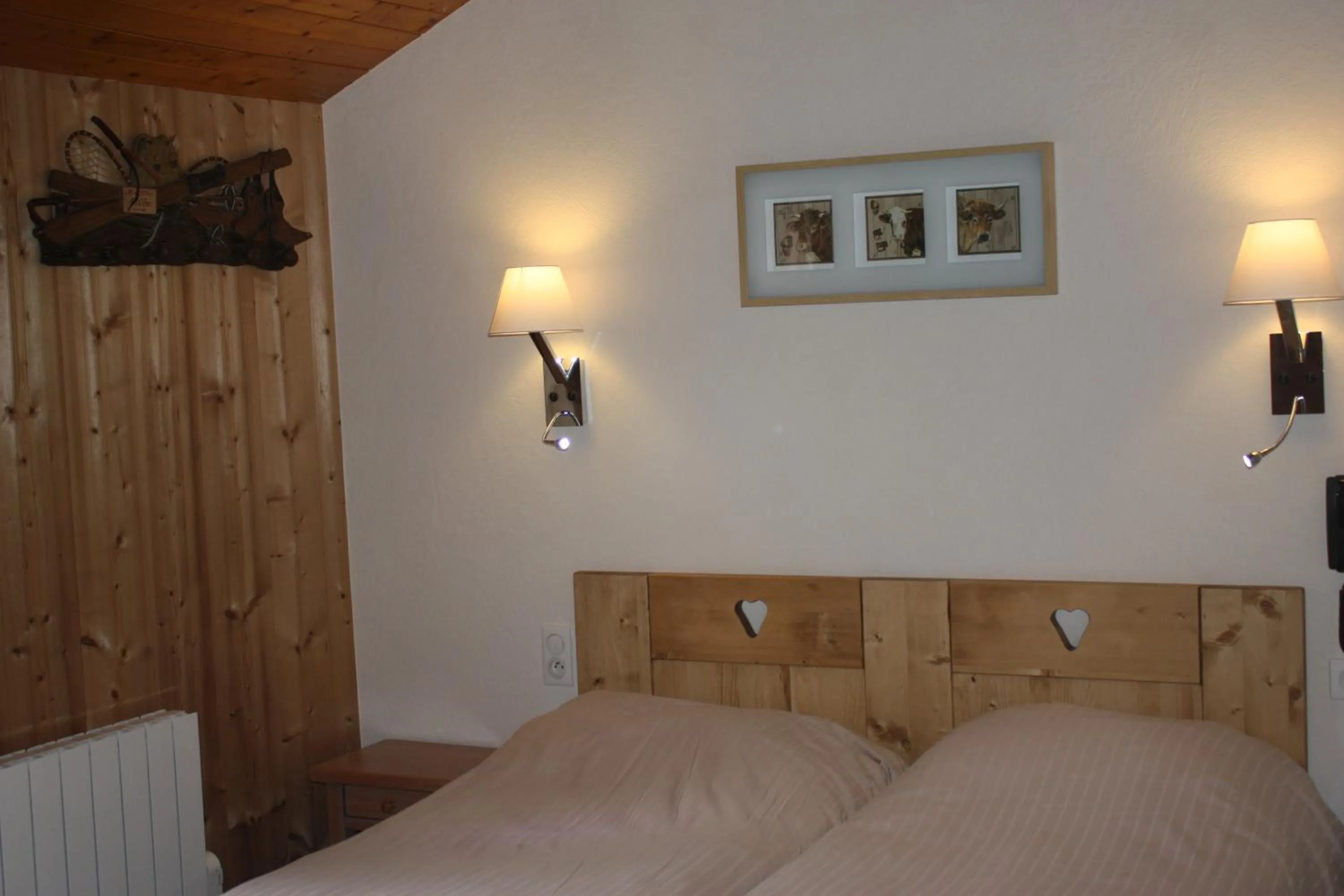 Decorative detail, Bed in Logis Hotel Gai Soleil