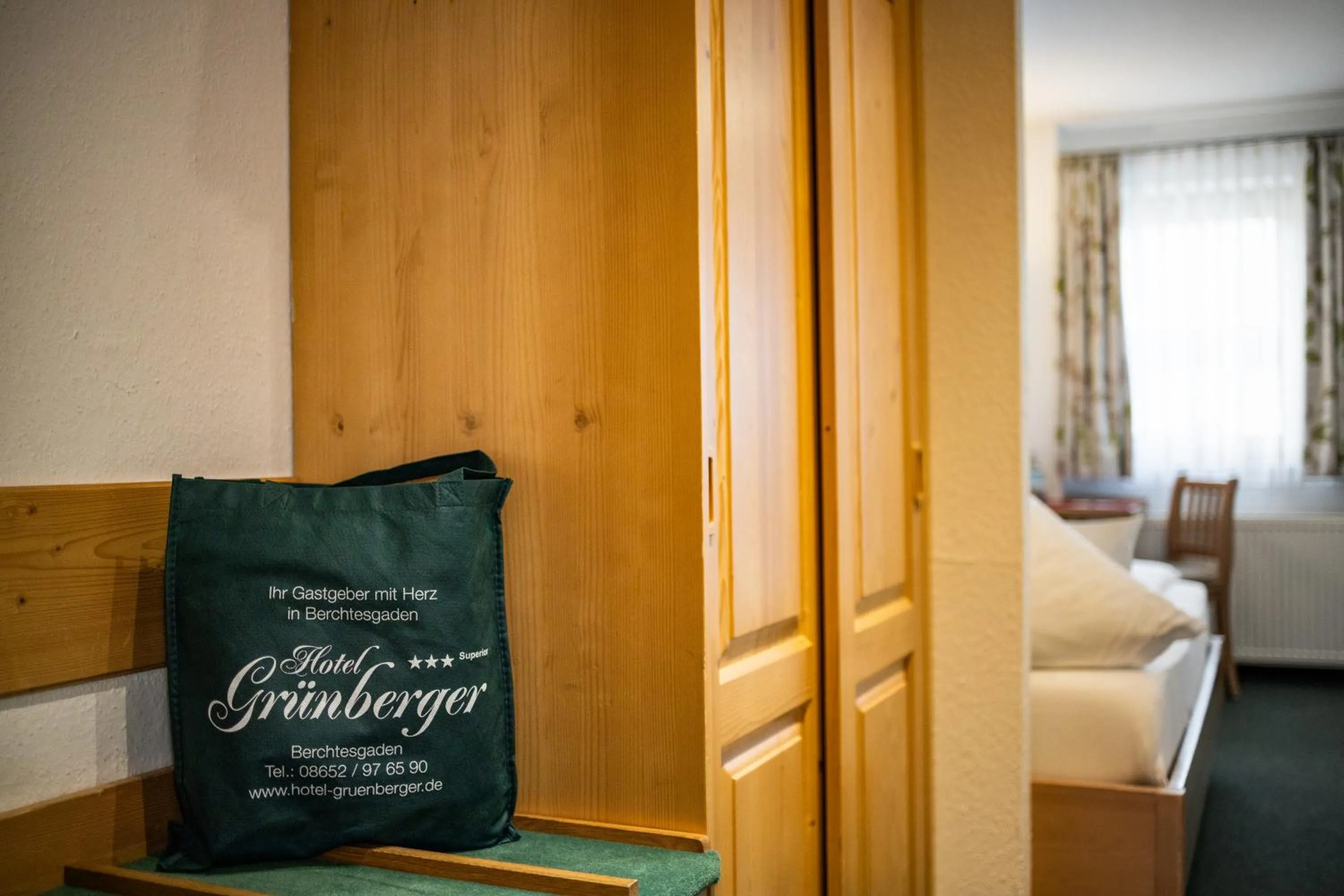 wardrobe, Bed in Hotel Gruenberger