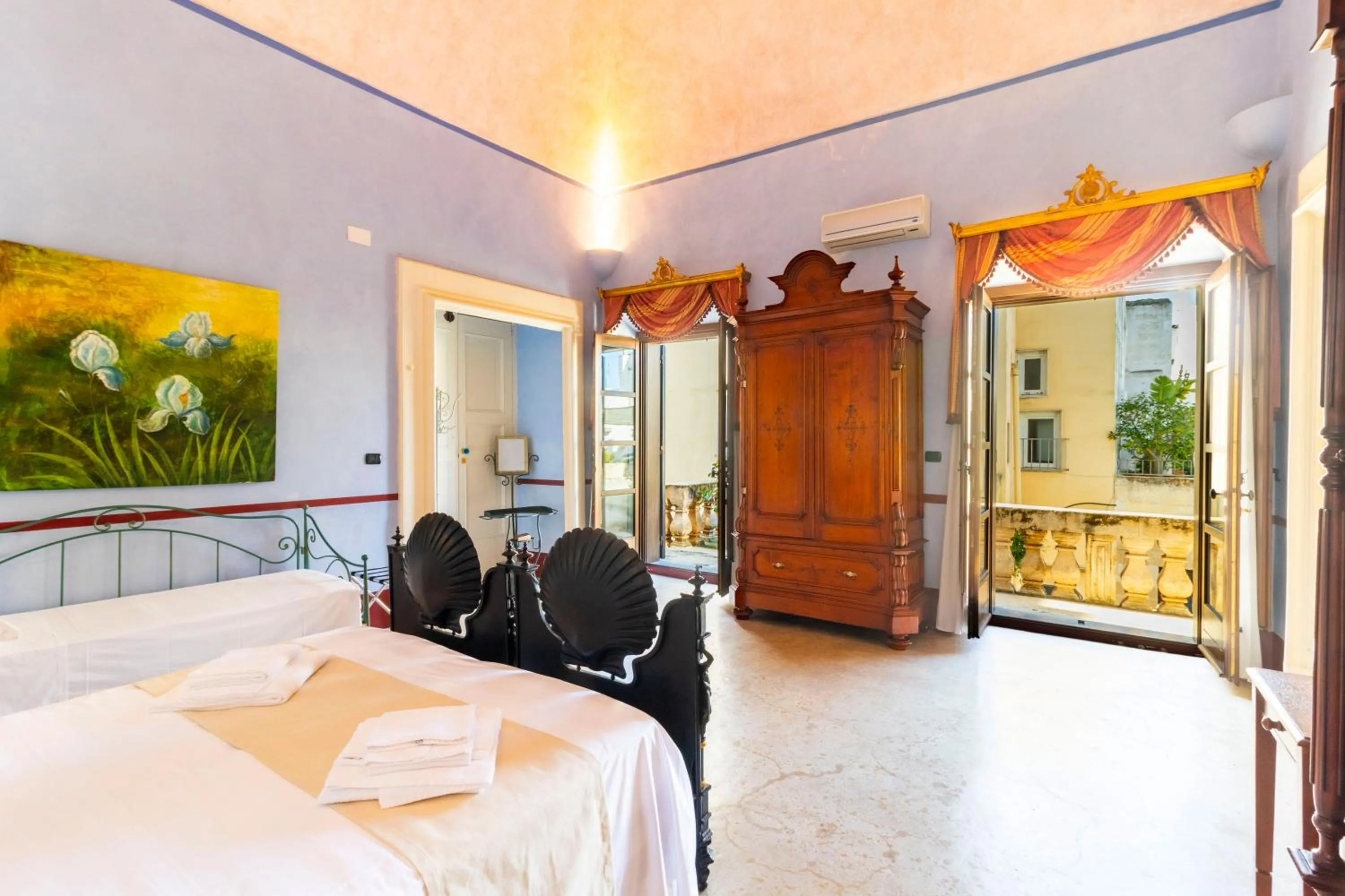 Photo of the whole room, Bed in Palazzo Insula