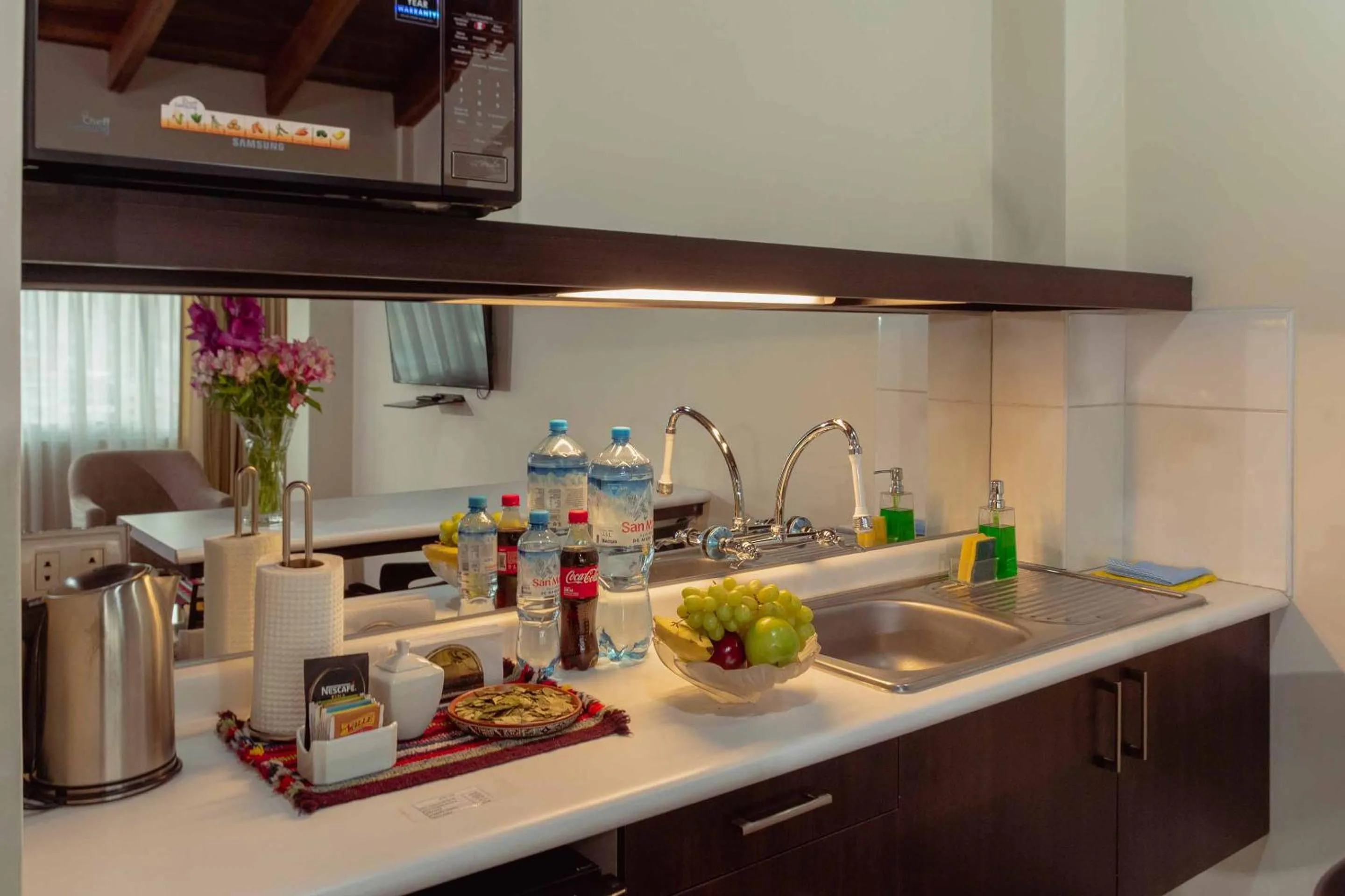 Kitchen or kitchenette in Group House Apart Hotel