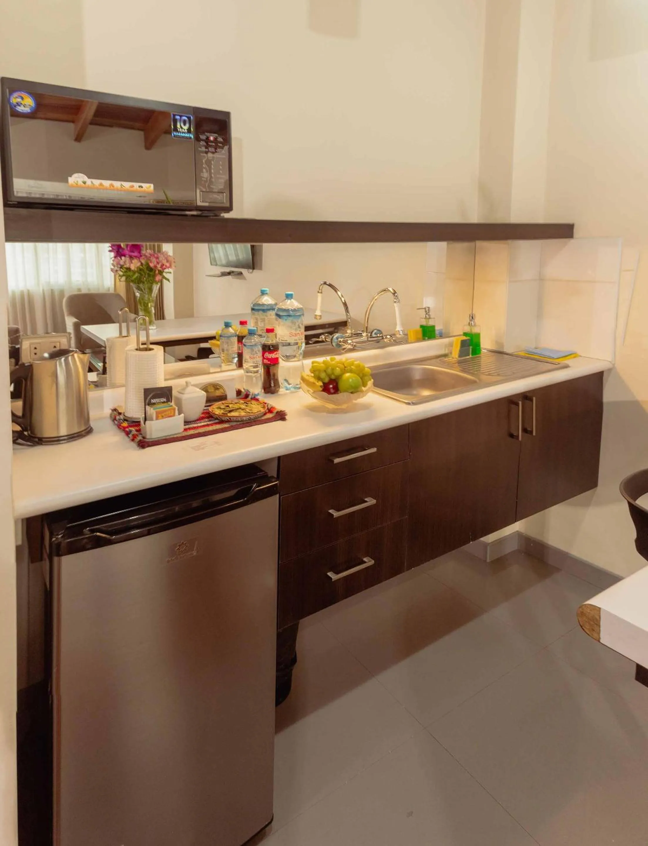 Kitchen or kitchenette in Group House Apart Hotel