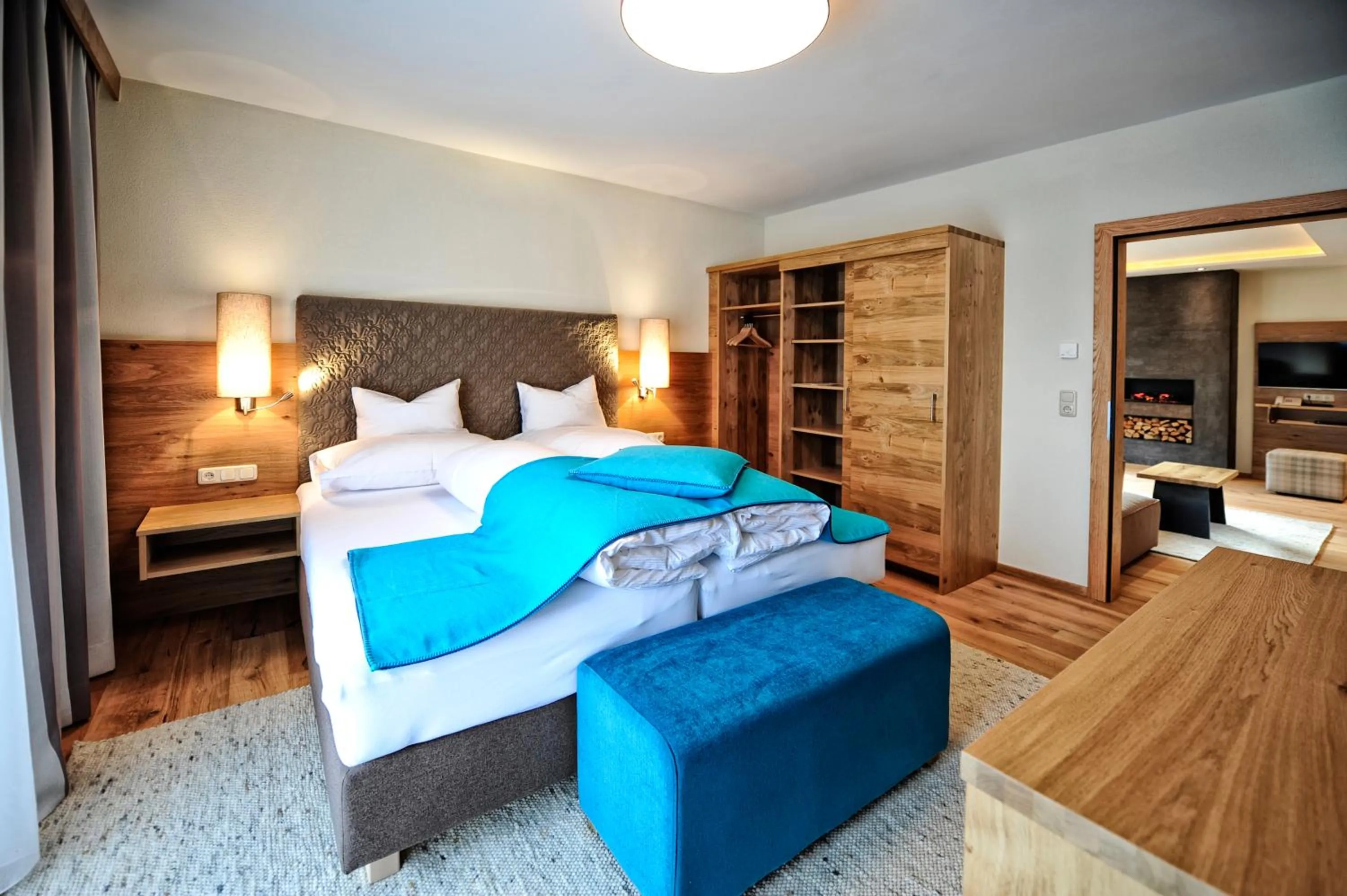 Bathroom, Bed in Hotel Dorfstadl