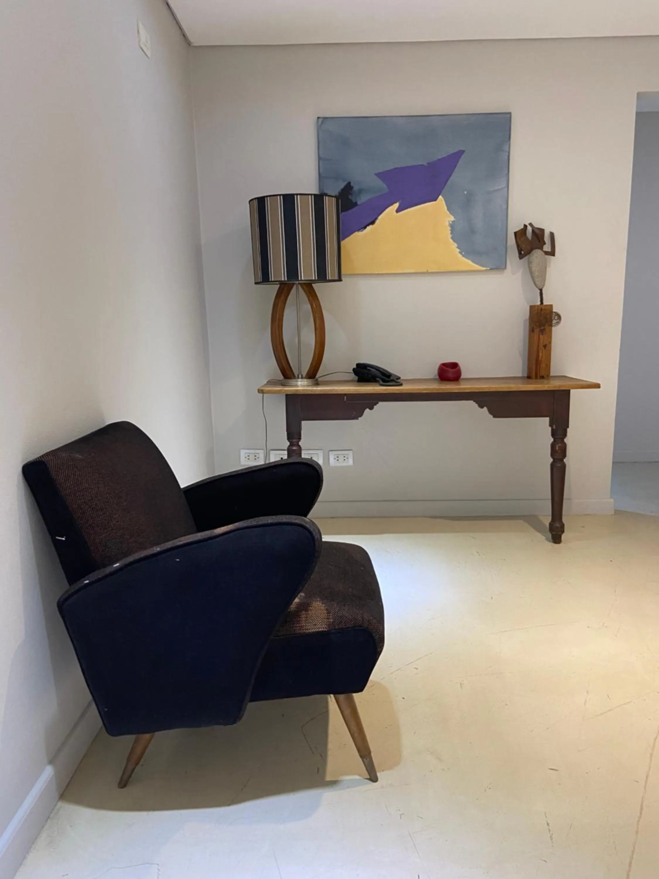 Seating area in First Palermo Hotel