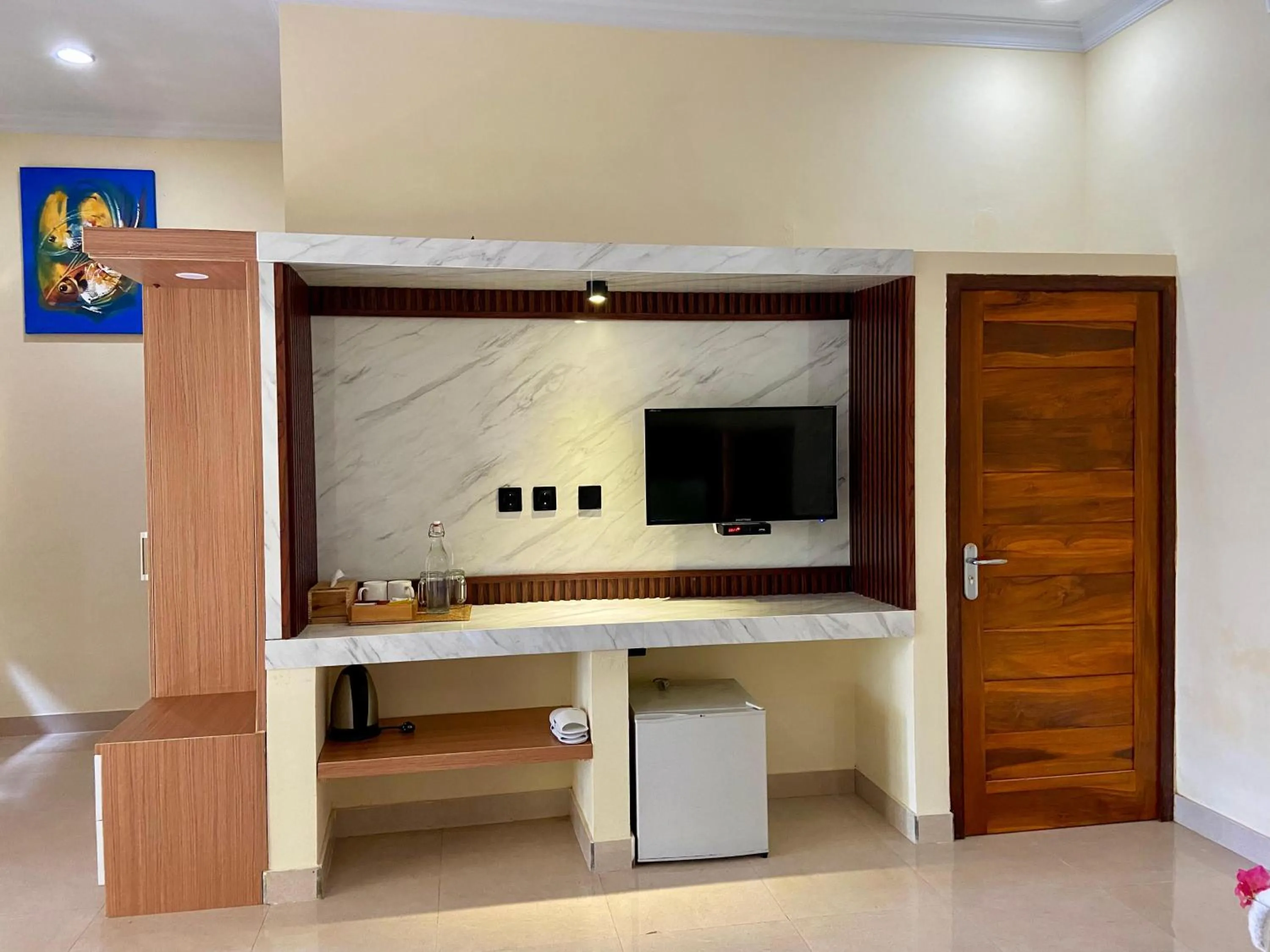 Communal lounge/ TV room in Villa Kinagu