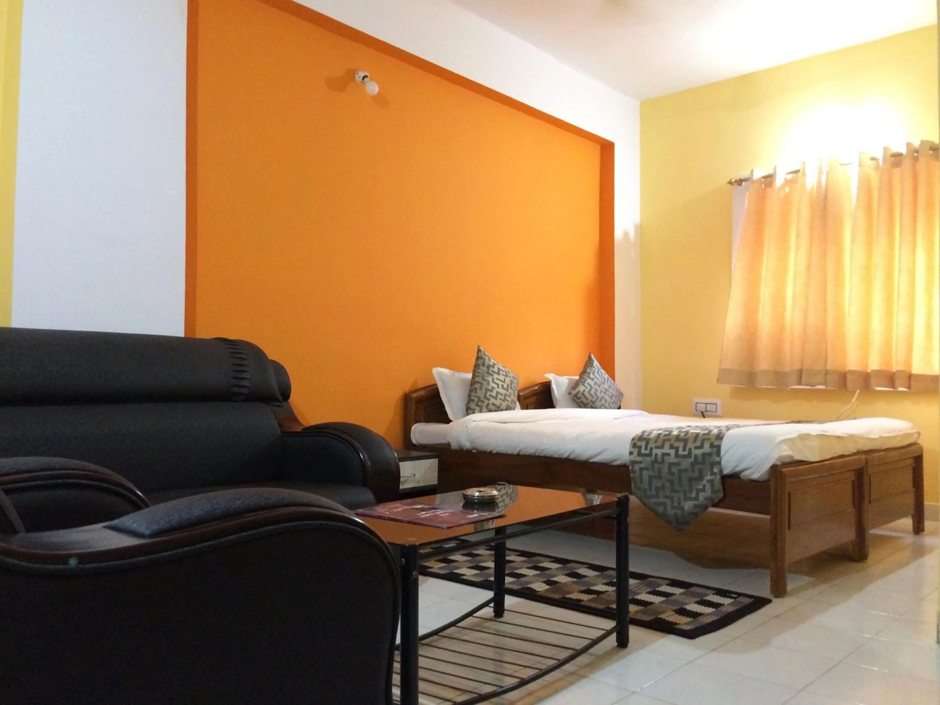 Photo of the whole room in Hotel Arham Inn