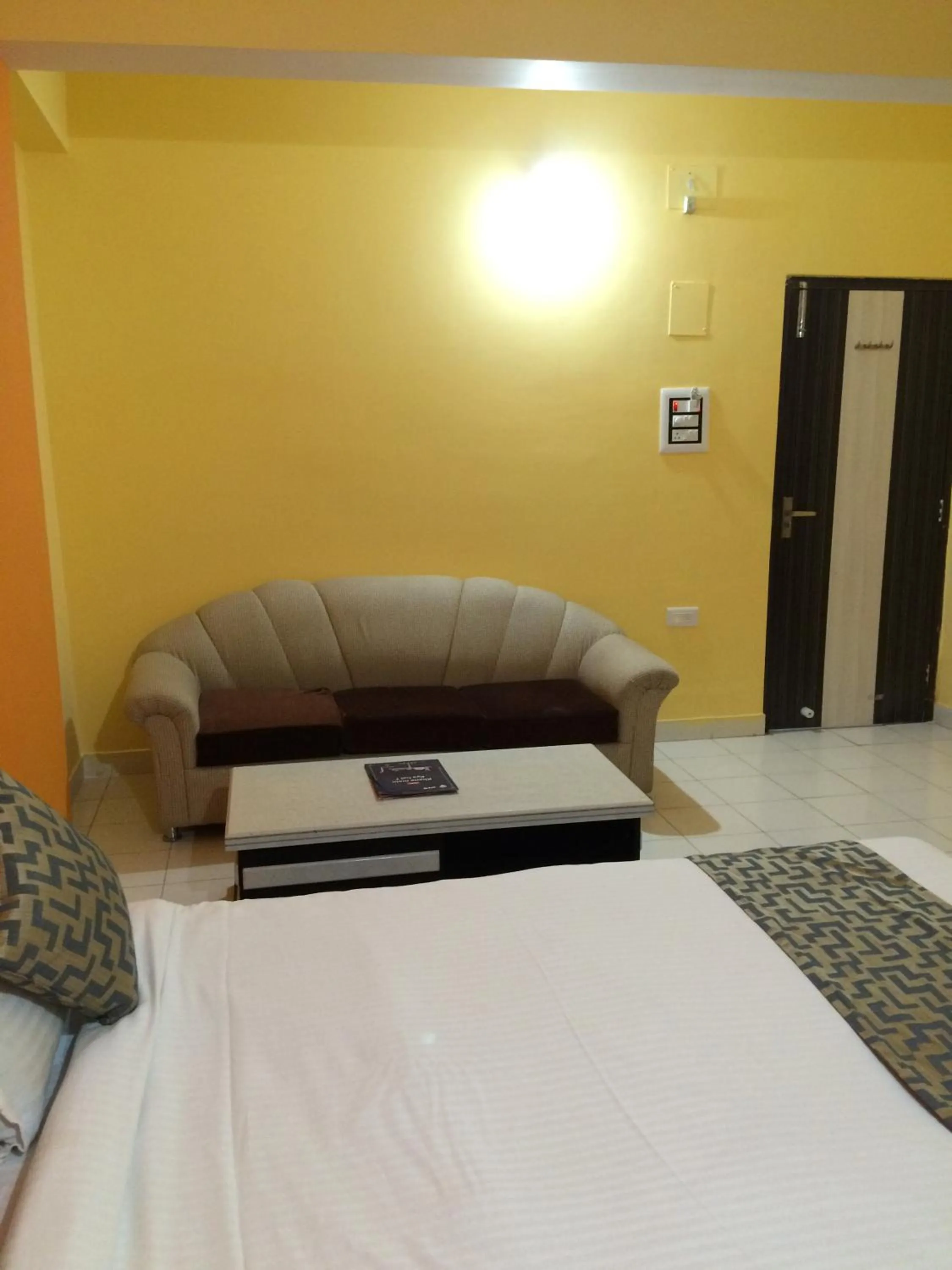 Photo of the whole room, Bed in Hotel Arham Inn