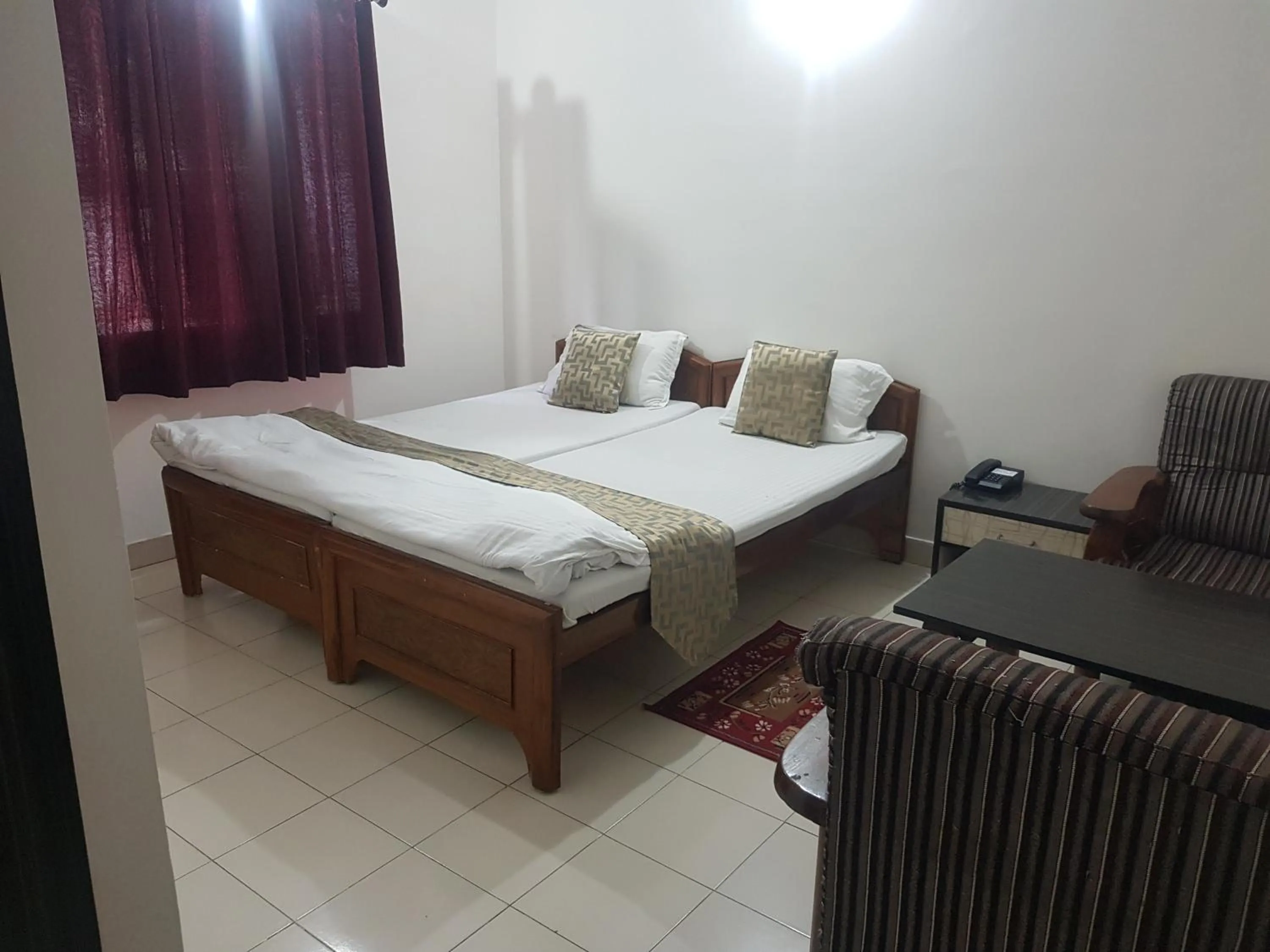 Bedroom, Bed in Hotel Arham Inn