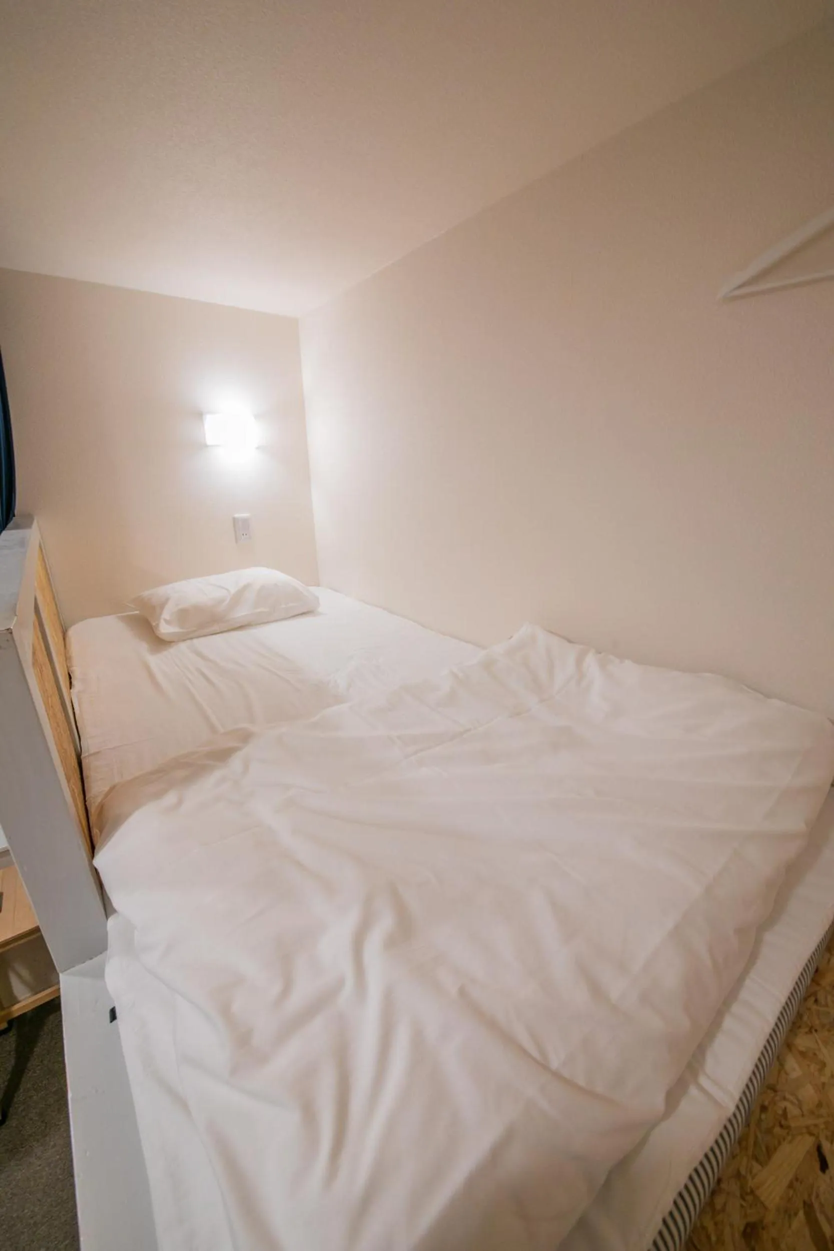 Bed in KIZUNA HOTEL Gojo Kiyomizu-dera Kamogawa