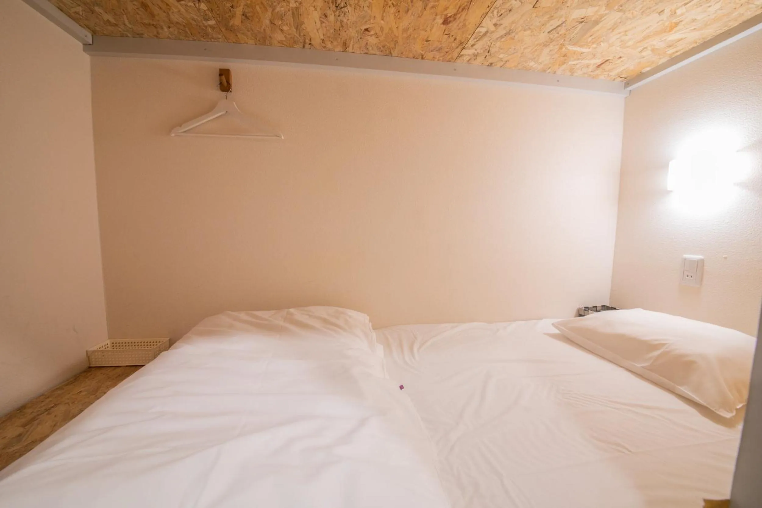 Bed in KIZUNA HOTEL Gojo Kiyomizu-dera Kamogawa