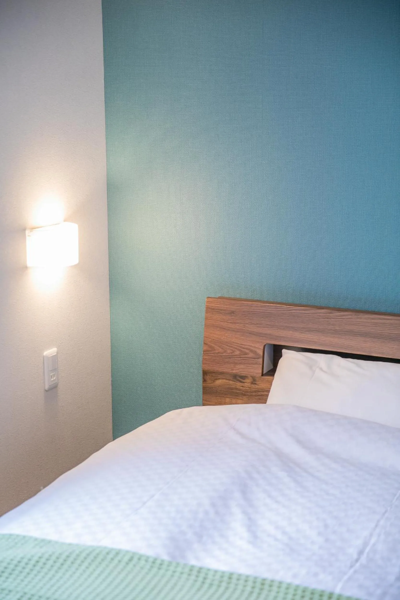 Bed in KIZUNA HOTEL Gojo Kiyomizu-dera Kamogawa