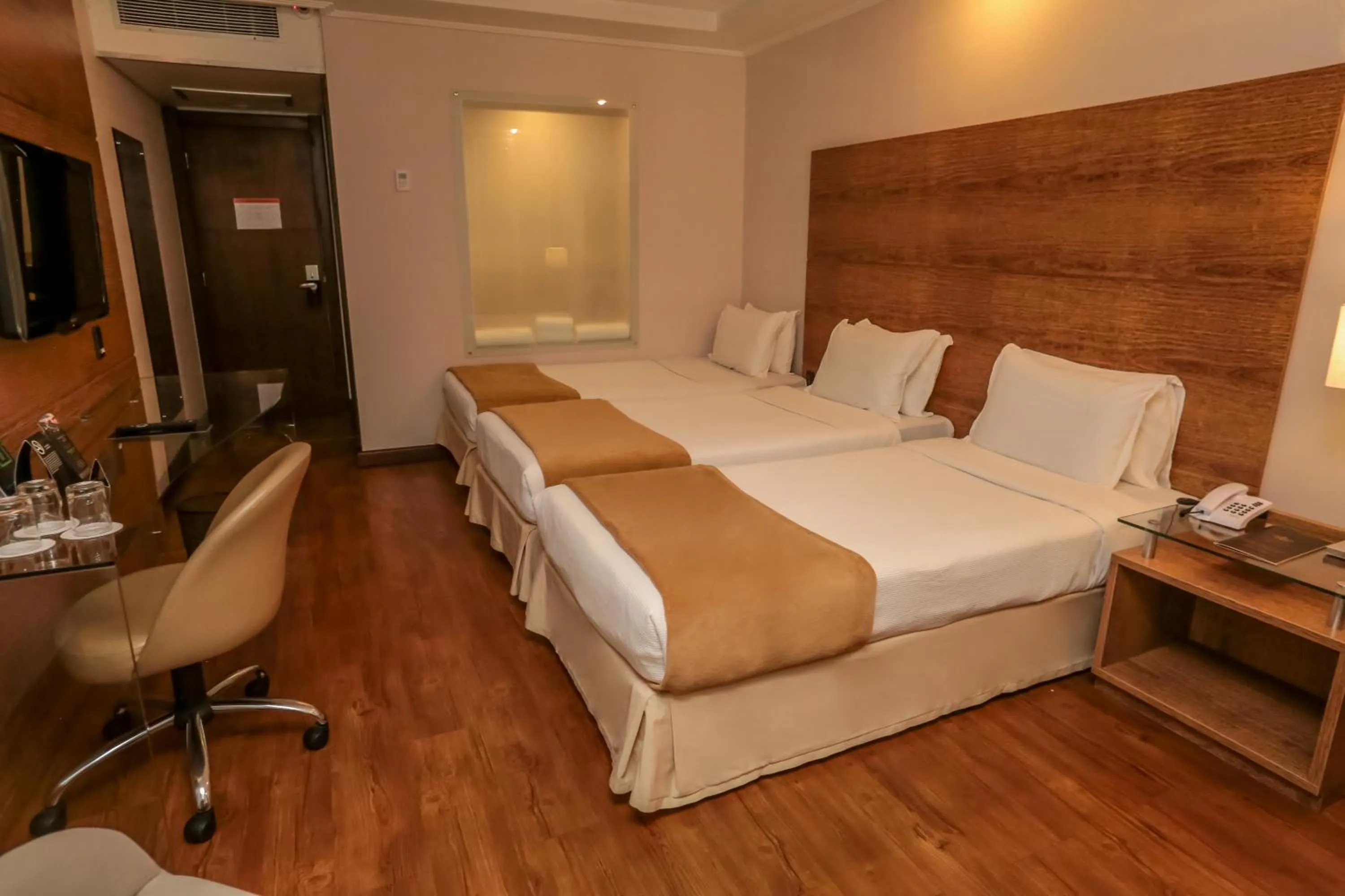 Bed in Majestic Palace Hotel