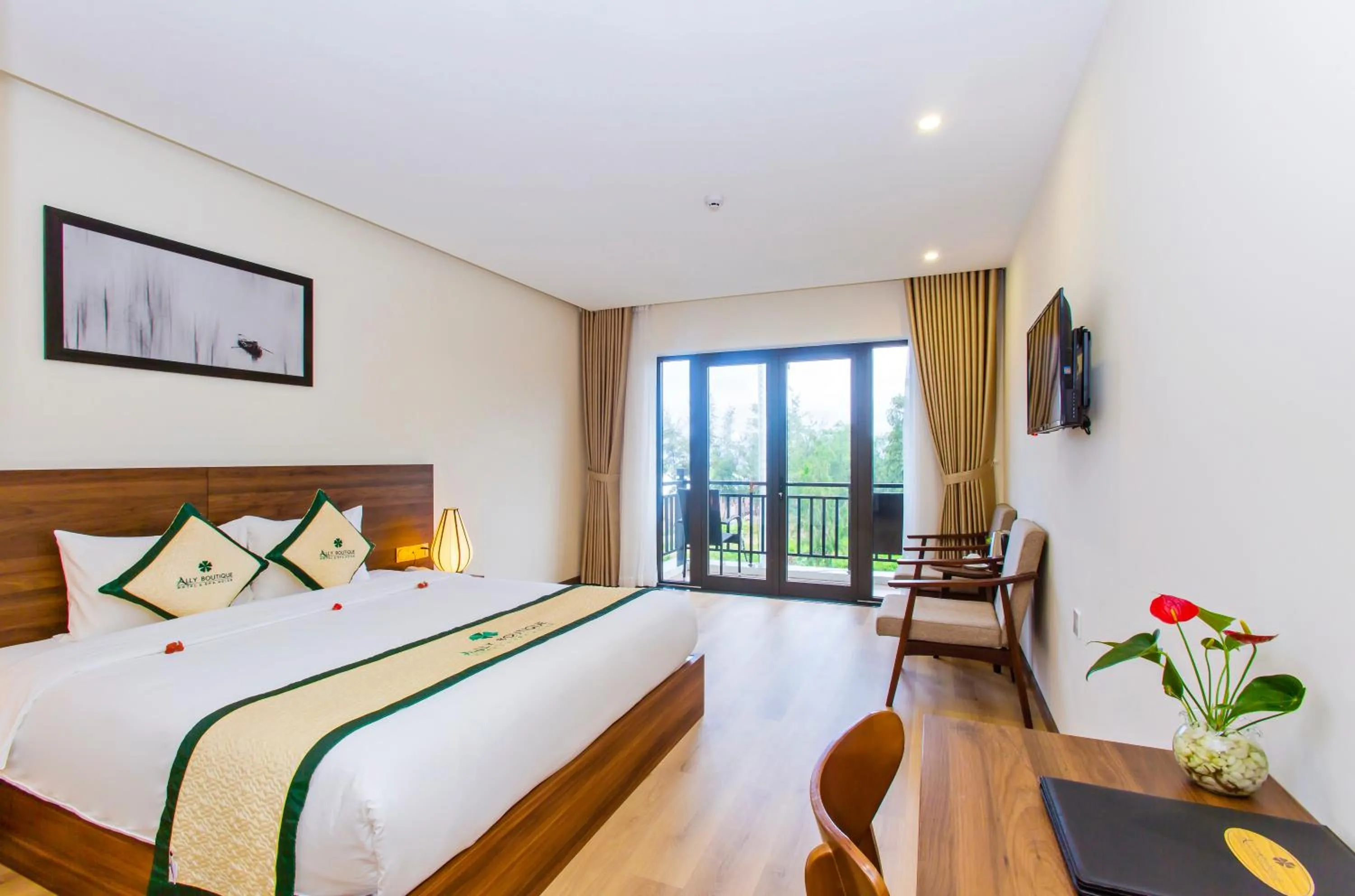 Bed in Ally Beach Boutique Hotel Hoian