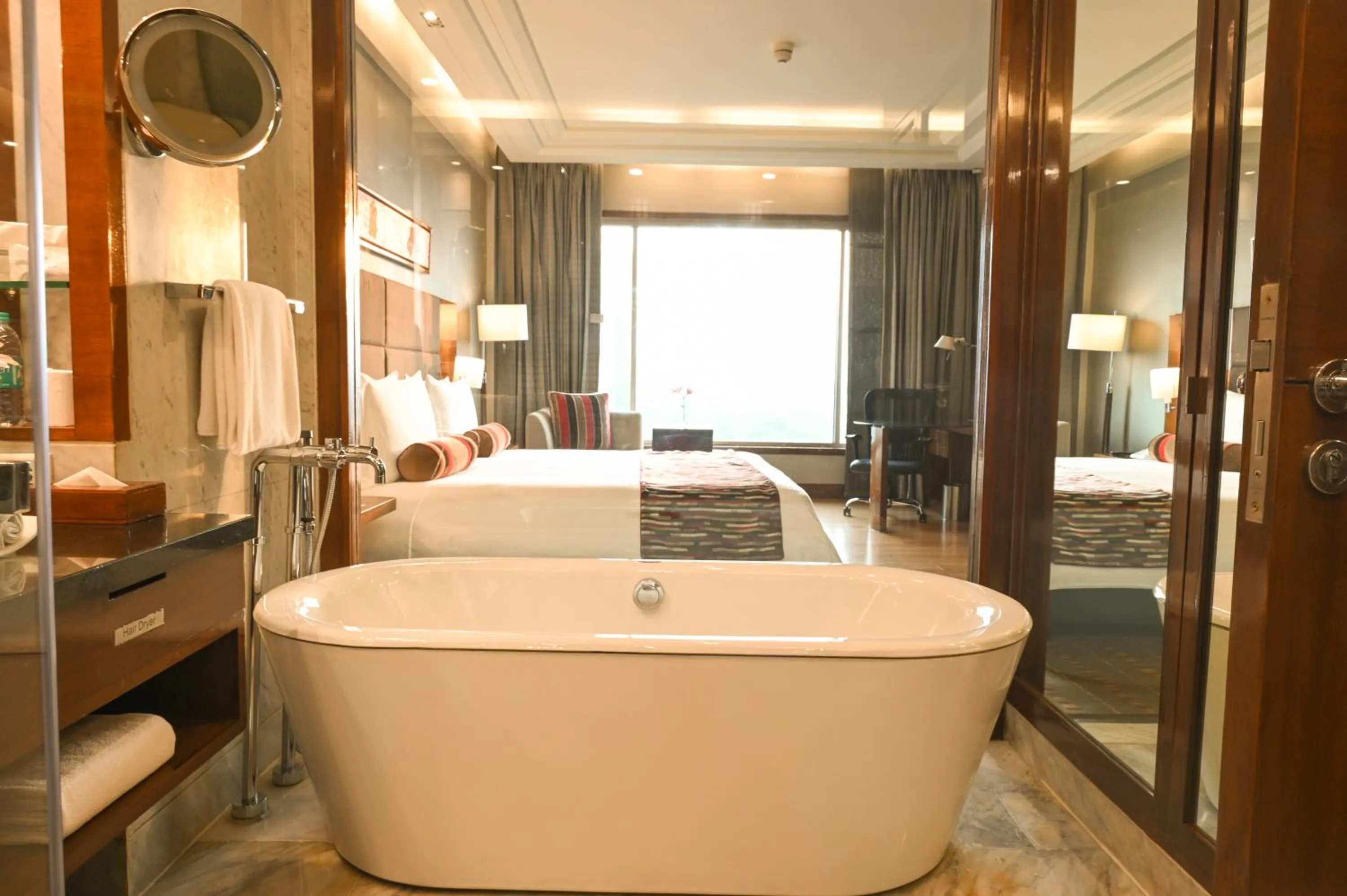 Bathroom, Bed in Crowne Plaza Today Gurugram by IHG