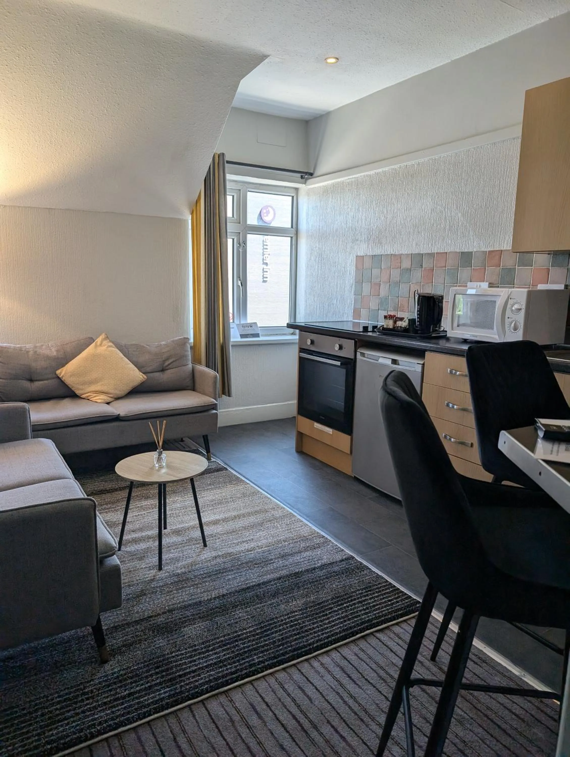 Seating area in Coasters Holiday Apartments